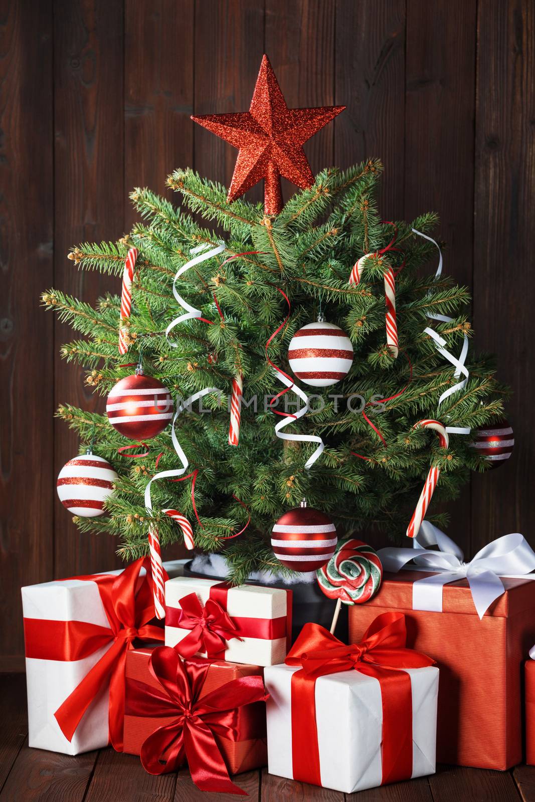 Merry christmas card with decorated christmas tree gifts and sweets