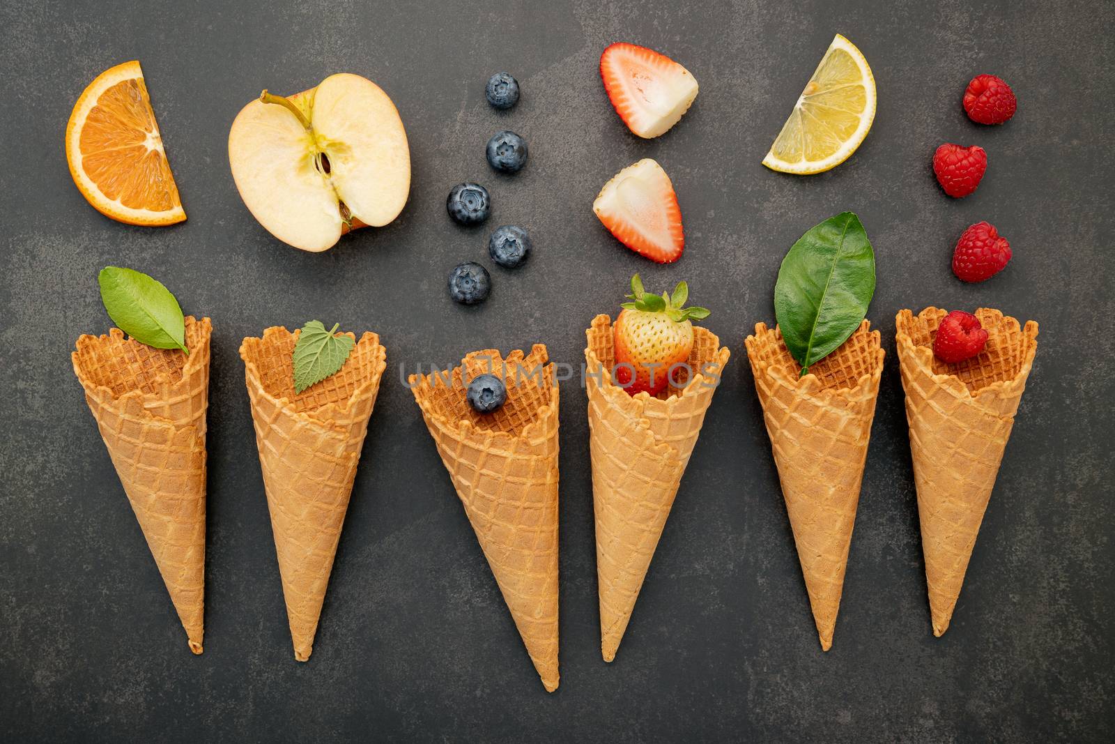 Various of fruits  in cones blueberry ,strawberry ,raspberries a by kerdkanno