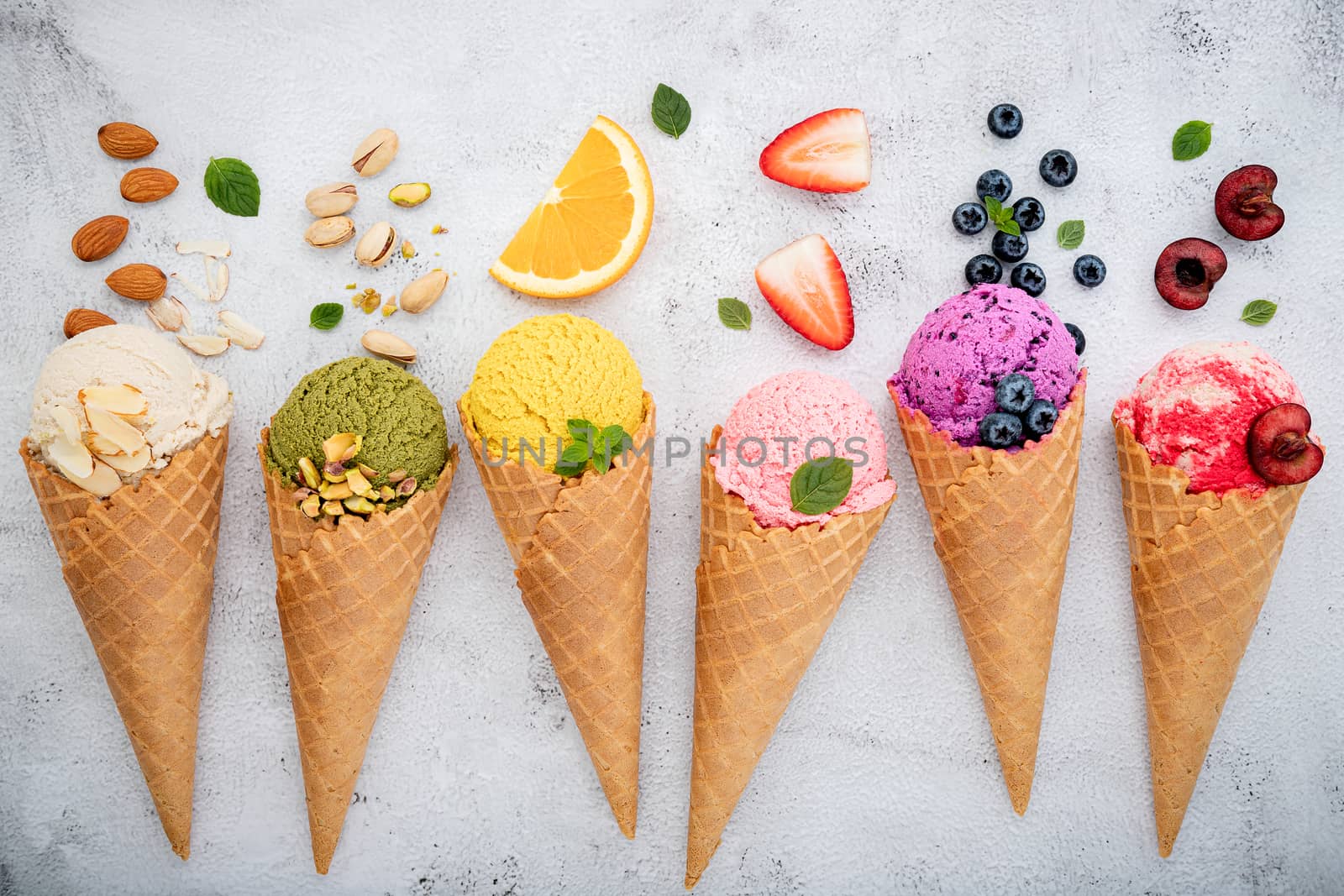 Various of ice cream flavor in cones blueberry ,pistachio ,almon by kerdkanno