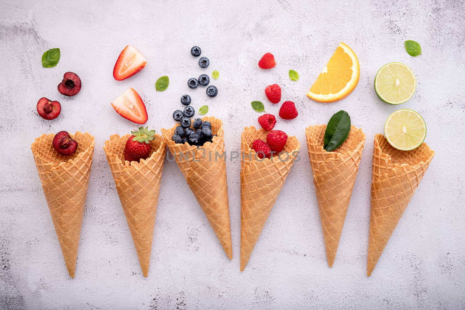 Various of fruits  in cones blueberry ,strawberry ,raspberries a by kerdkanno