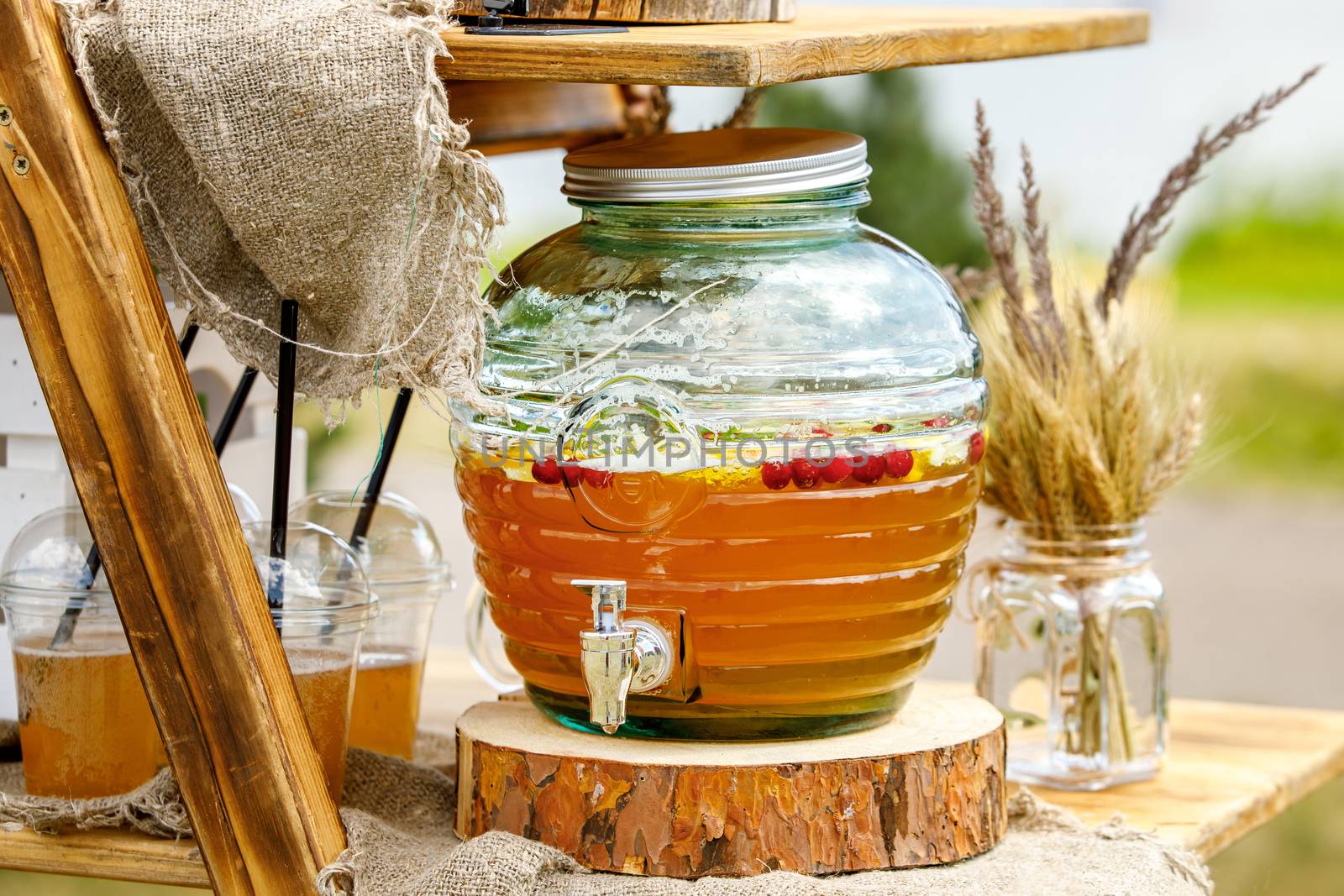 Jugs of lemonade at the summer outdoor party