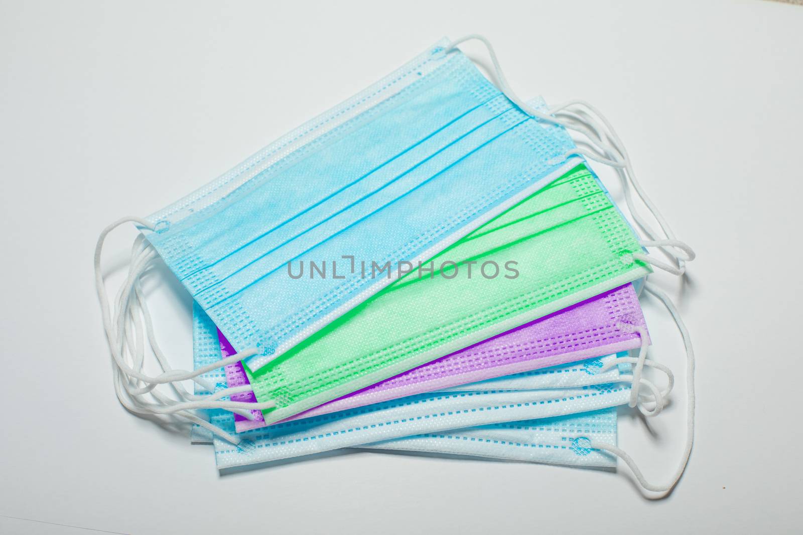 Face mask in colors stock photo