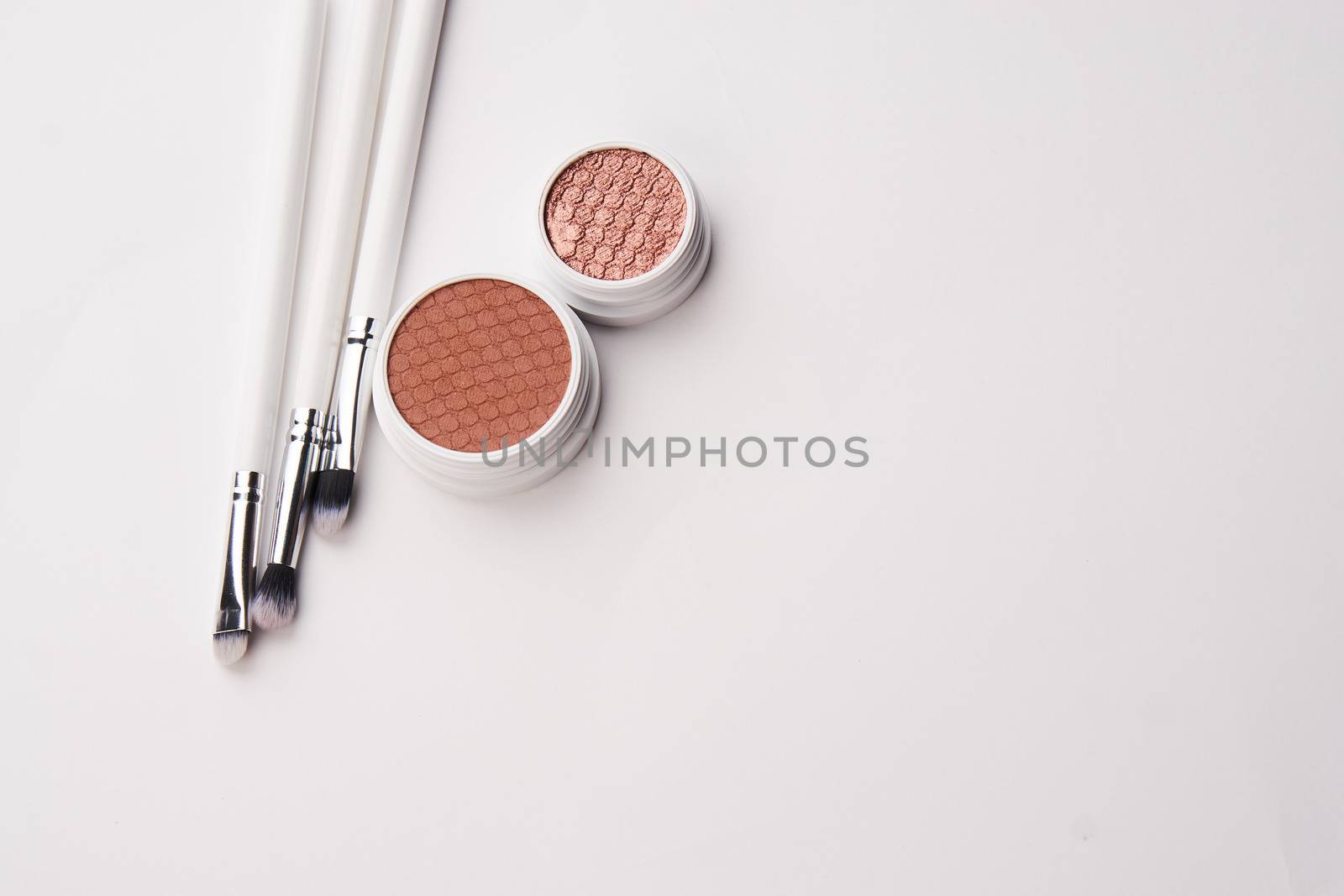 professional eyeshadow on isolated background and makeup brushes cosmetics fashion. High quality photo