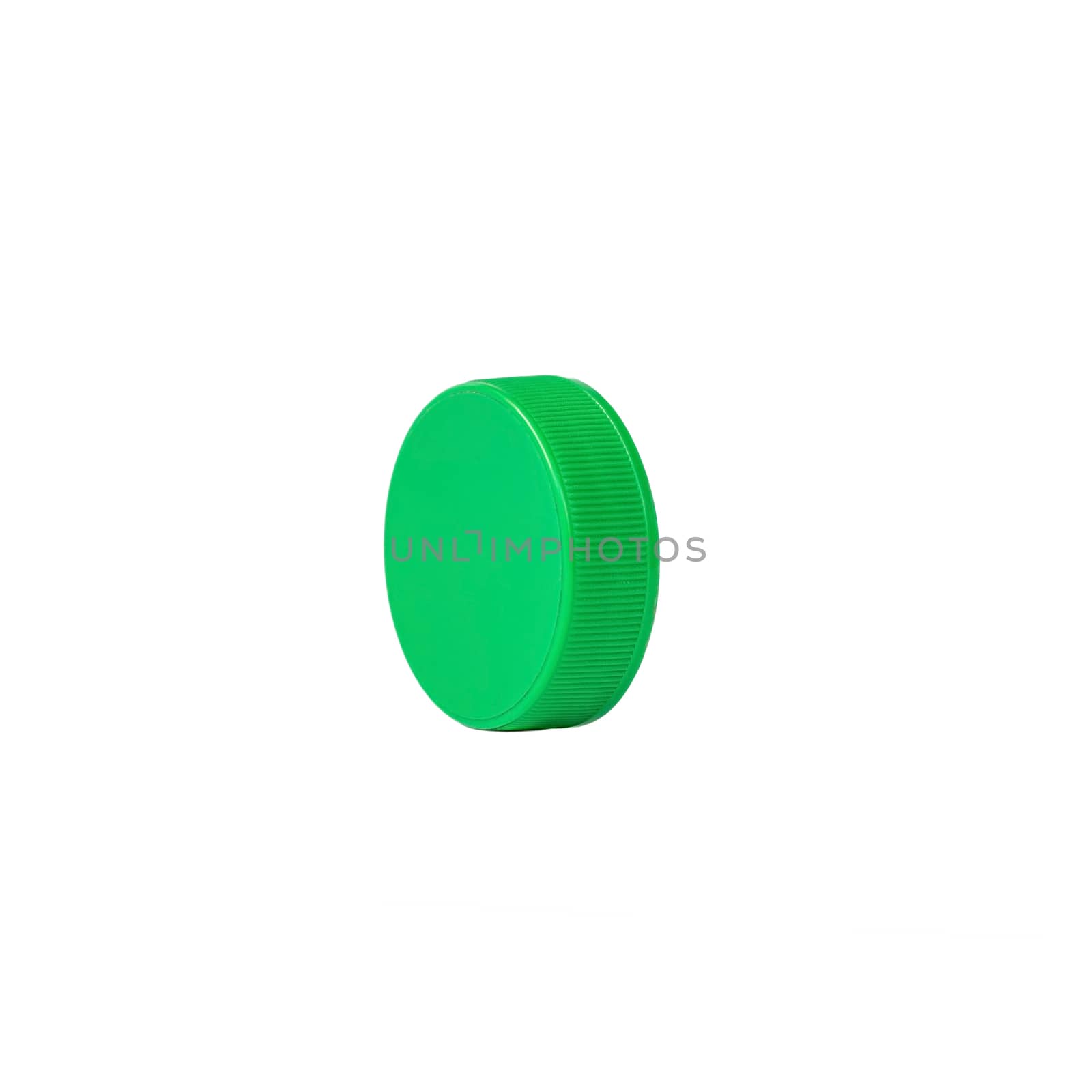 Green plastic bottle cap isolated on white background.