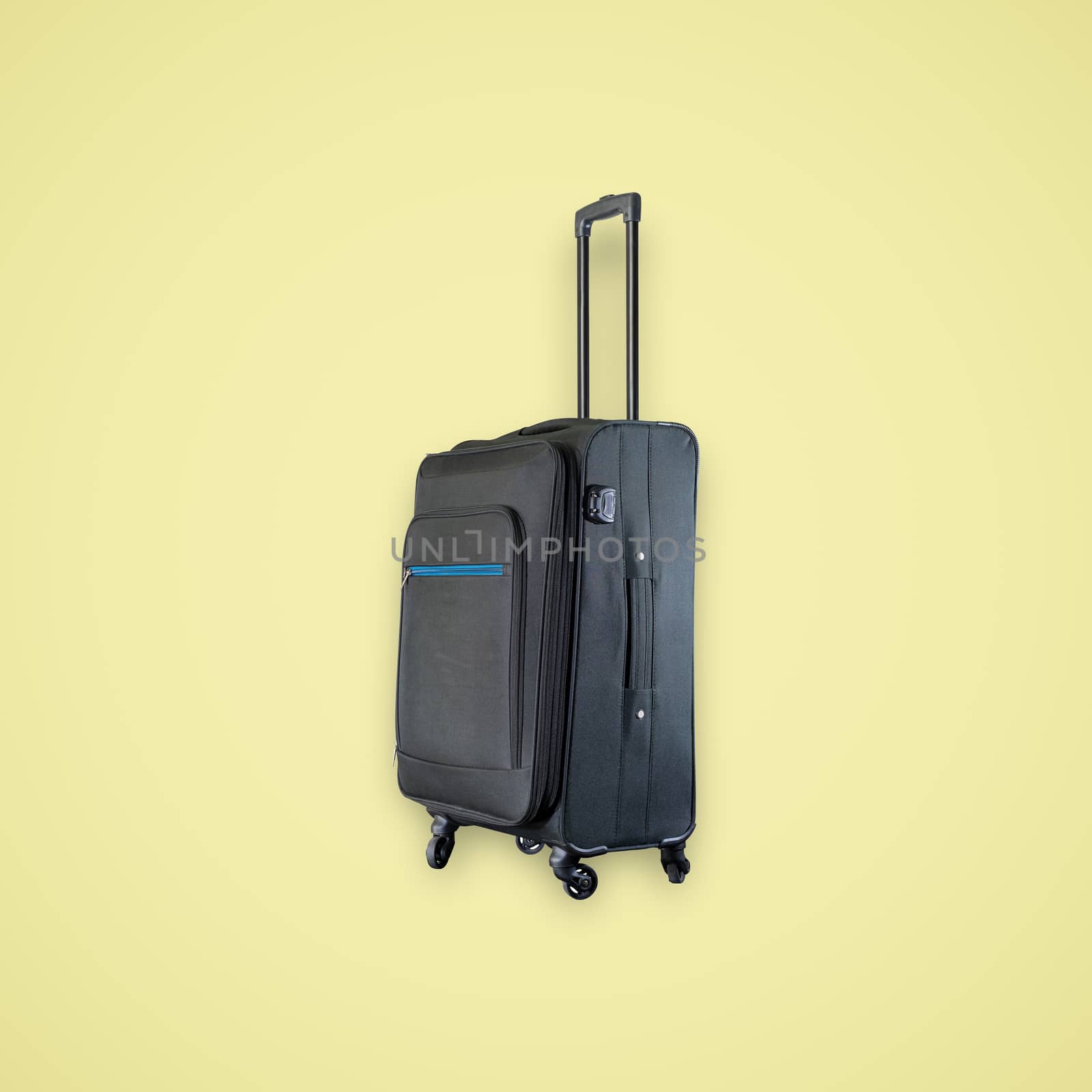 Black suitcase isolated on beautiful pastel color background, with clipping path.