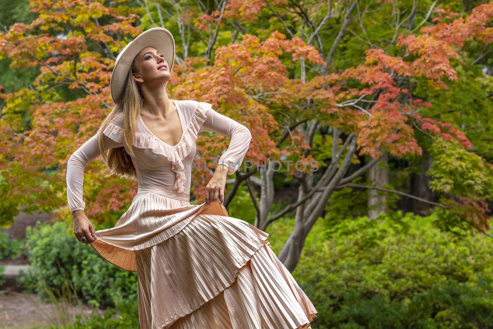 A Lovely Blonde Model Poses In Her Beautiful Fall Clothing by actionsports