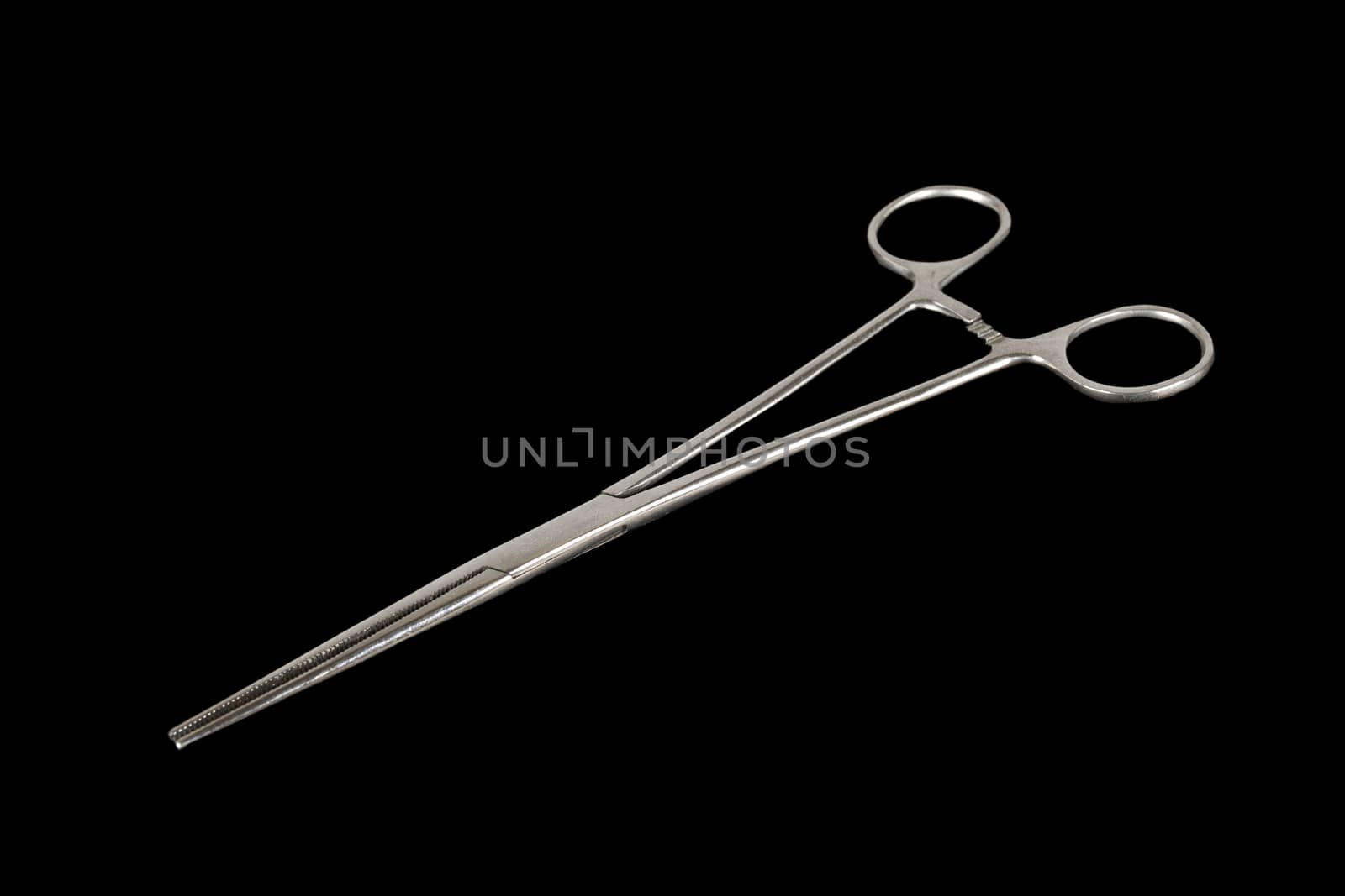 Forceps isolated on a black background by 977_ReX_977