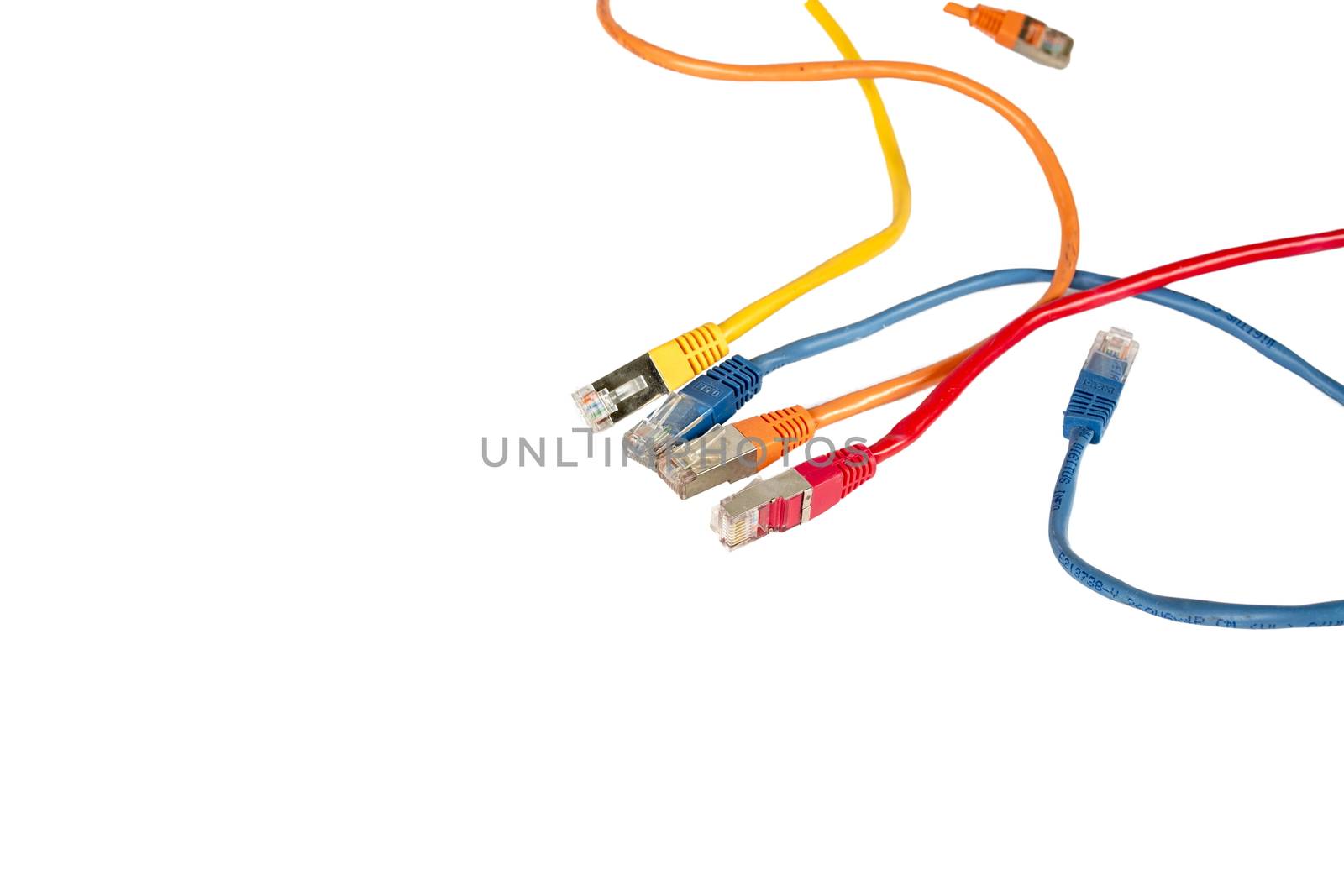 Multi-colored cables for a computer network. Isolated over white background. Red blue yellow and orange. place for an inscription, copy space