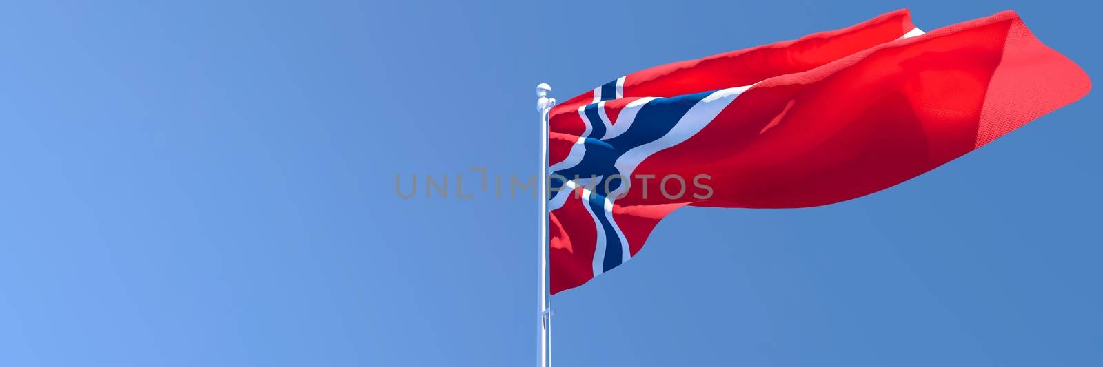 3D rendering of the national flag of Norway waving in the wind against a blue sky