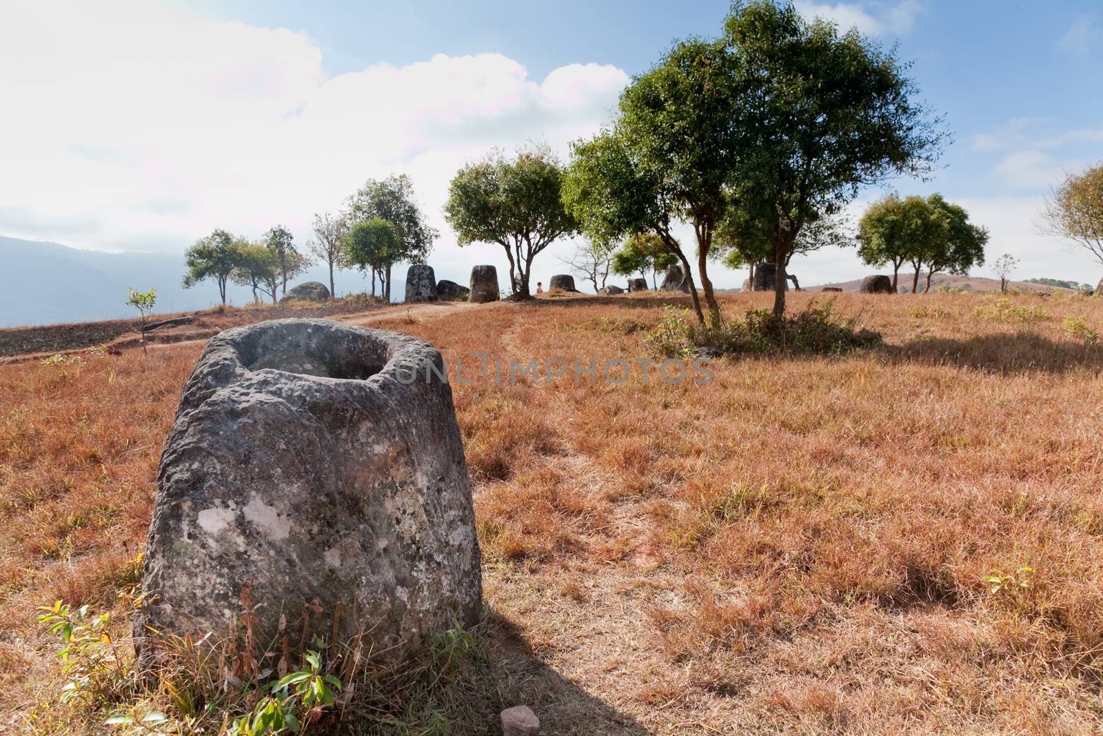 Plain of Jars, Phonsavan, Laos, historic site, the landscape of this area is dotted with hundreds of mysterious stone vessels or jars more than 2000 years old. Also the site of extensive bombing by America in the Vietnam War High quality photo