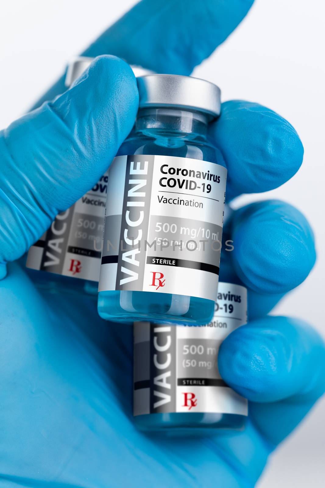 Doctor or Nurse Wearing Surgical Glove Holding Coronavirus COVID-19 Vaccine Vials.