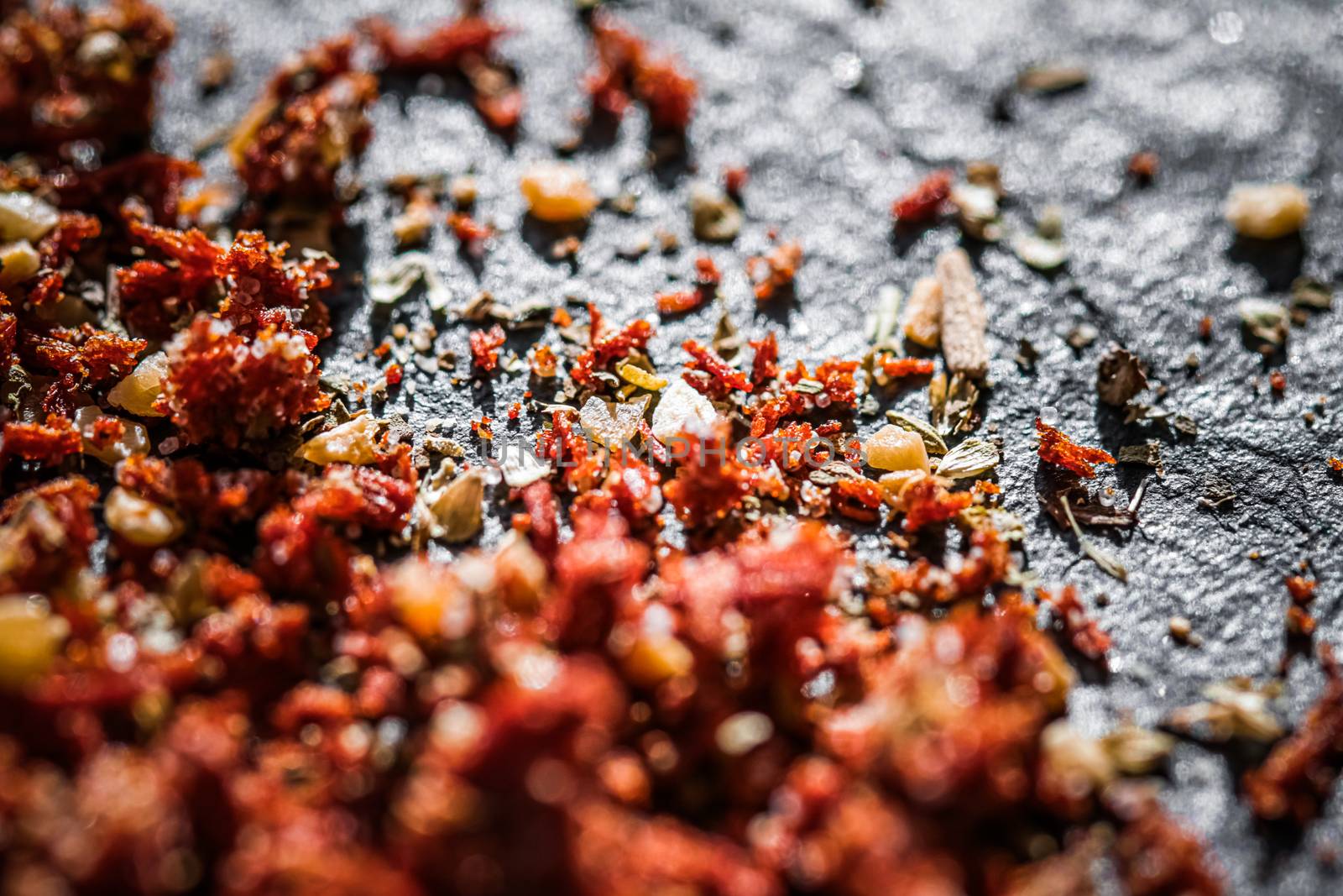 Dried tomato and chili pepper closeup on luxury stone background as flat lay, dry food spices and recipe ingredients