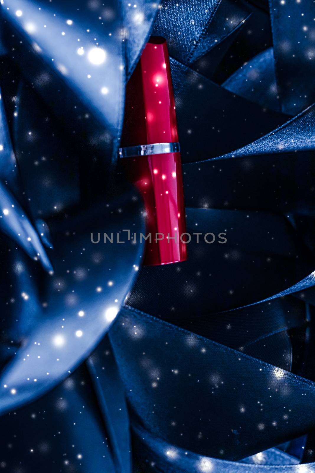 Red lipstick on blue silk and shiny glitter background, luxury make-up and beauty cosmetic by Anneleven