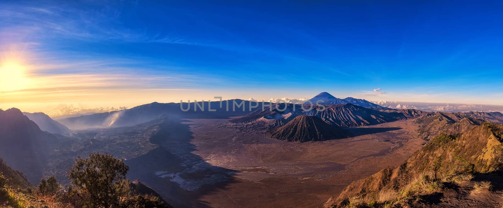 Sunrise at Mount Bromo volcano beautiful landscape landmark and popular destinations, the magnificent view of Mt. Bromo located in Bromo Tengger Semeru National Park, East Java, Indonesia.