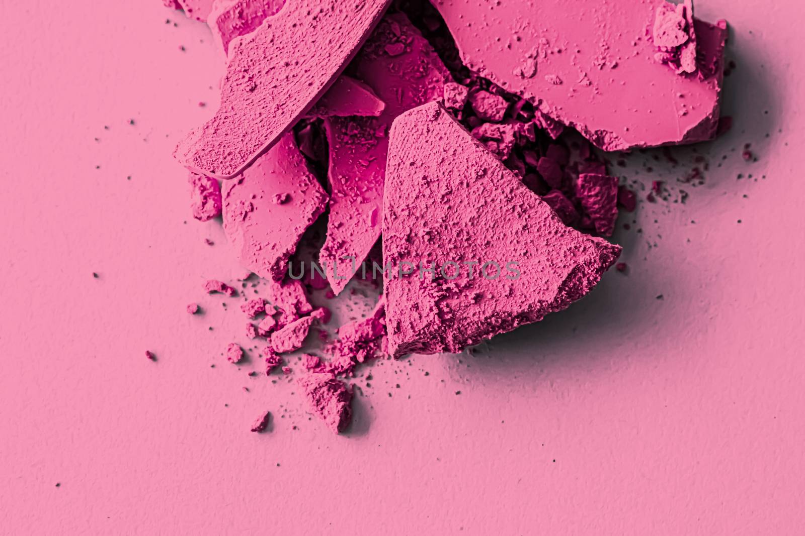 Pink eye shadow powder as makeup palette closeup, crushed cosmetics and beauty textures