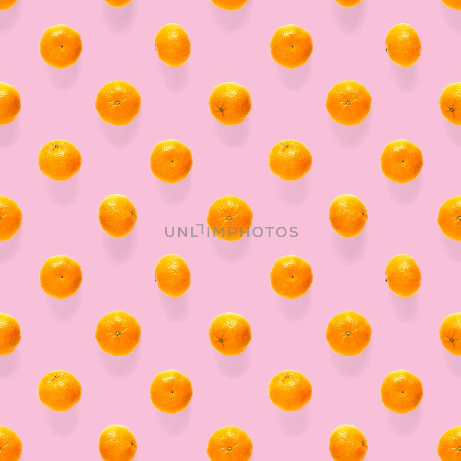 Fresh mandarin Seamles pattern. Ripe fruit tangerines seamless pattern. Fresh citrus isolated on pink background pattern. Flat lay of Clementine. Mandarine modern tropical seamless background.