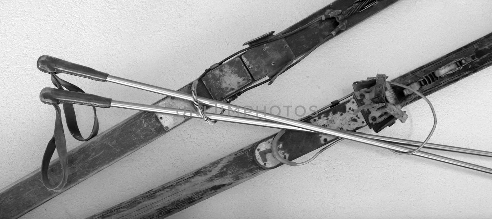 Old ski and ski poles by michaklootwijk