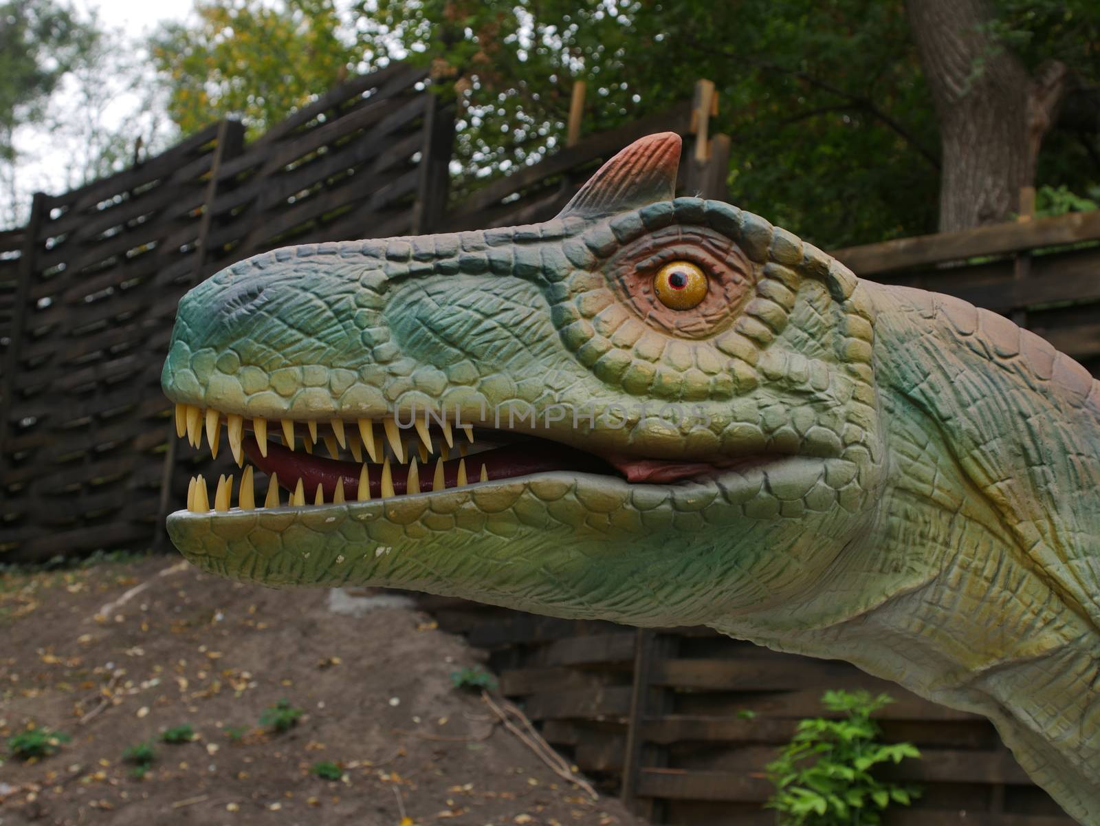 Dinosaurs figures in local autumn park, Ukraine