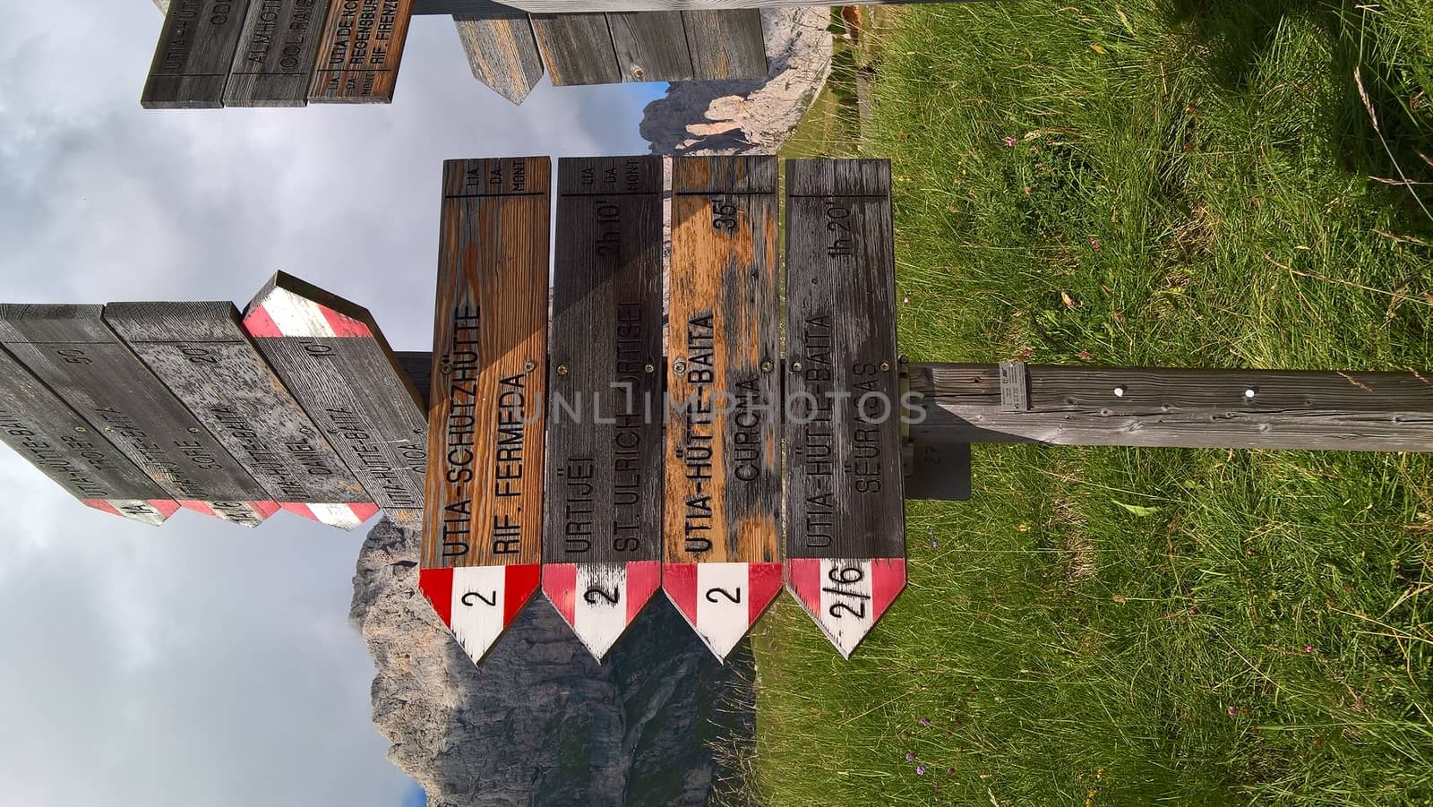 Val Gardena, Italy - 09/15/2020: Scenic alpine place with magical Dolomites mountains in background, amazing clouds and blue sky in Trentino Alto Adige region, Italy, Europe