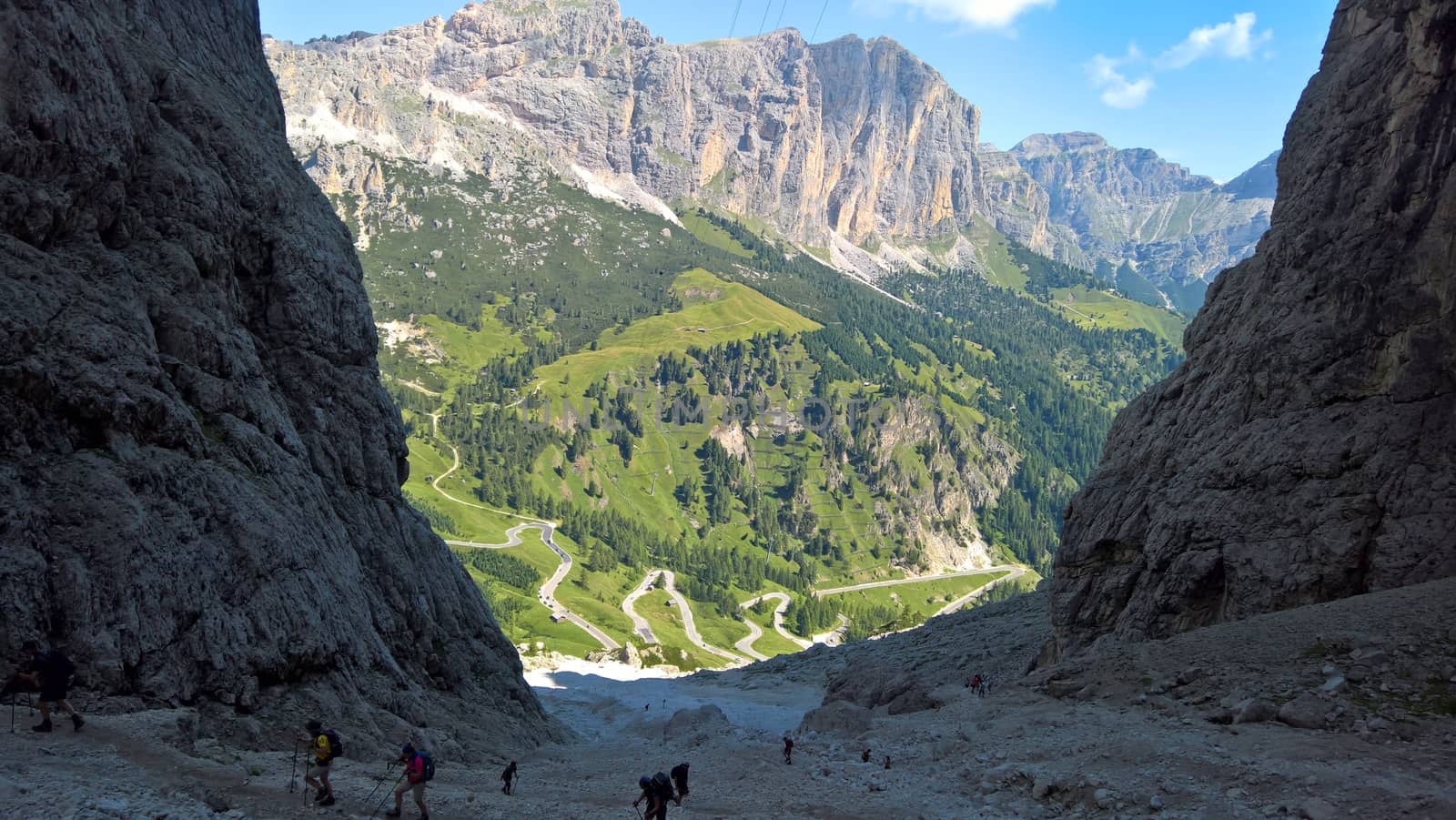 Val Gardena, Italy - 09/15/2020: Scenic alpine place with magical Dolomites mountains in background, amazing clouds and blue sky in Trentino Alto Adige region, Italy, Europe