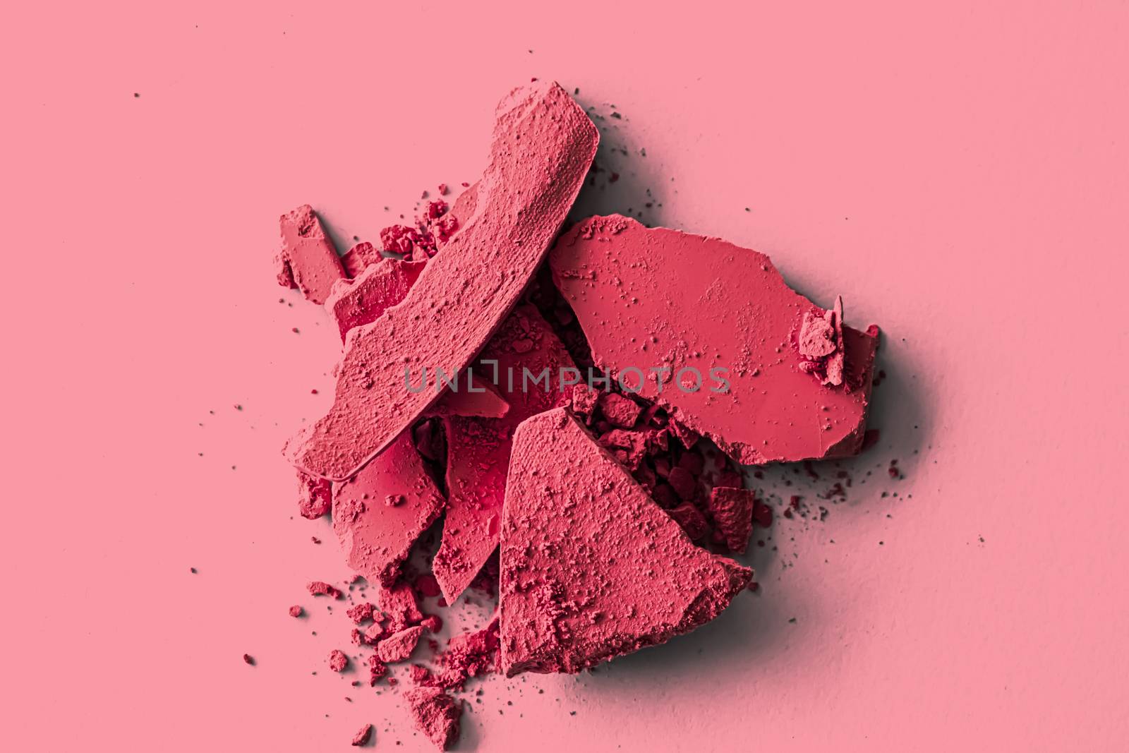 Red eye shadow powder as makeup palette closeup, crushed cosmetics and beauty texture by Anneleven
