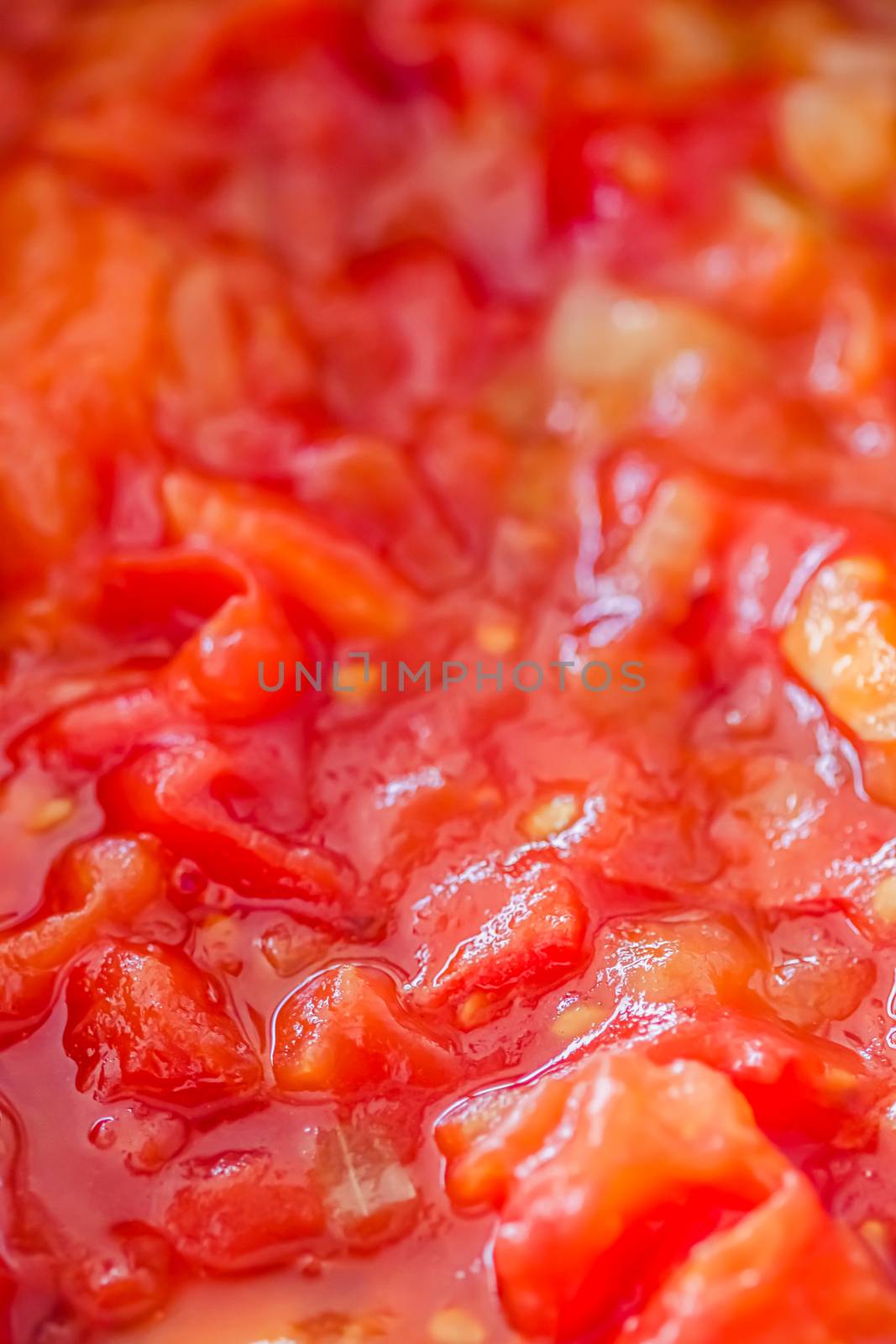 Cooking tomato sauce, closeup steamed vegetables for cook book or food blog background by Anneleven