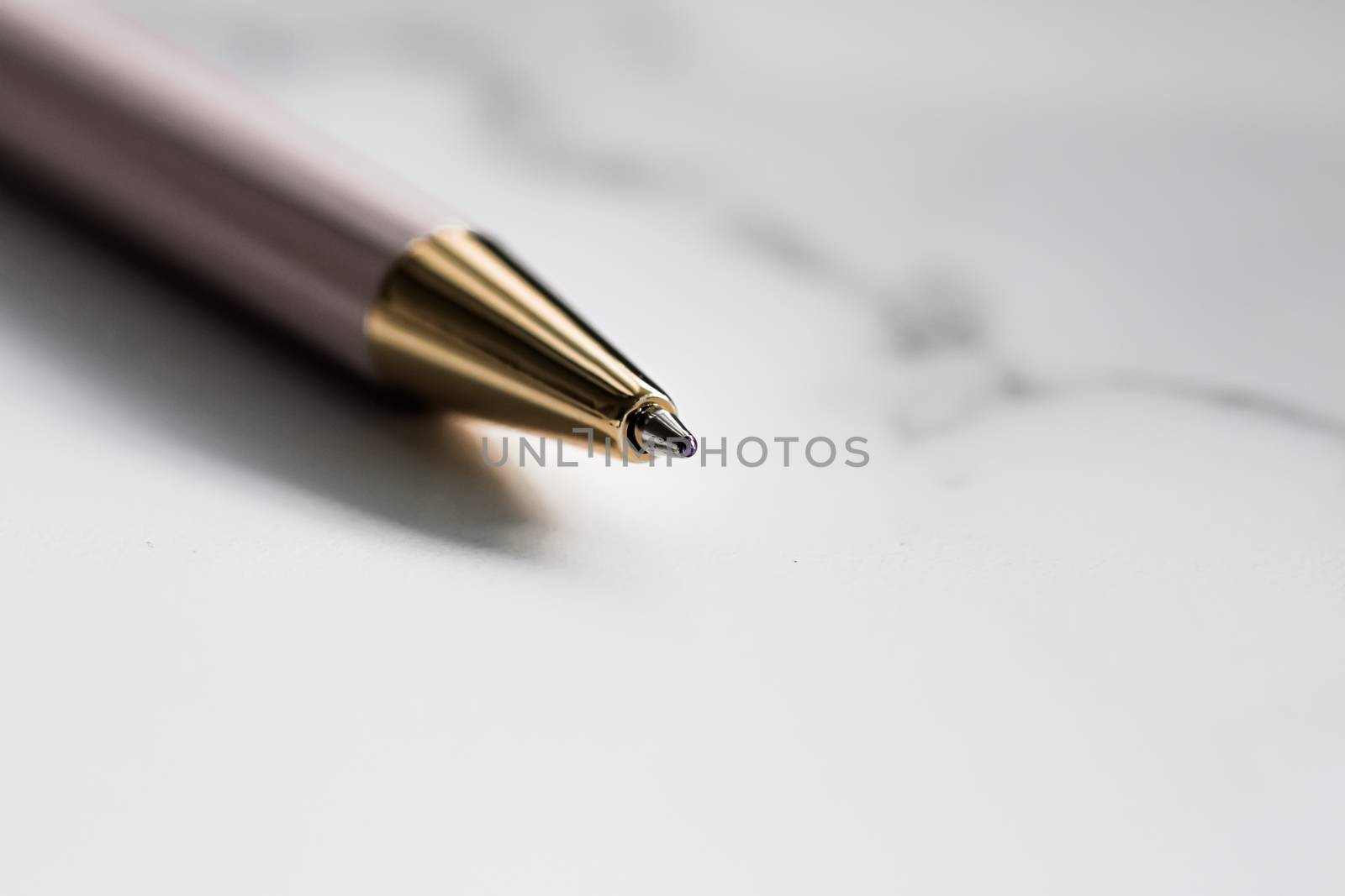 White pen on marble background, luxury stationery and business branding