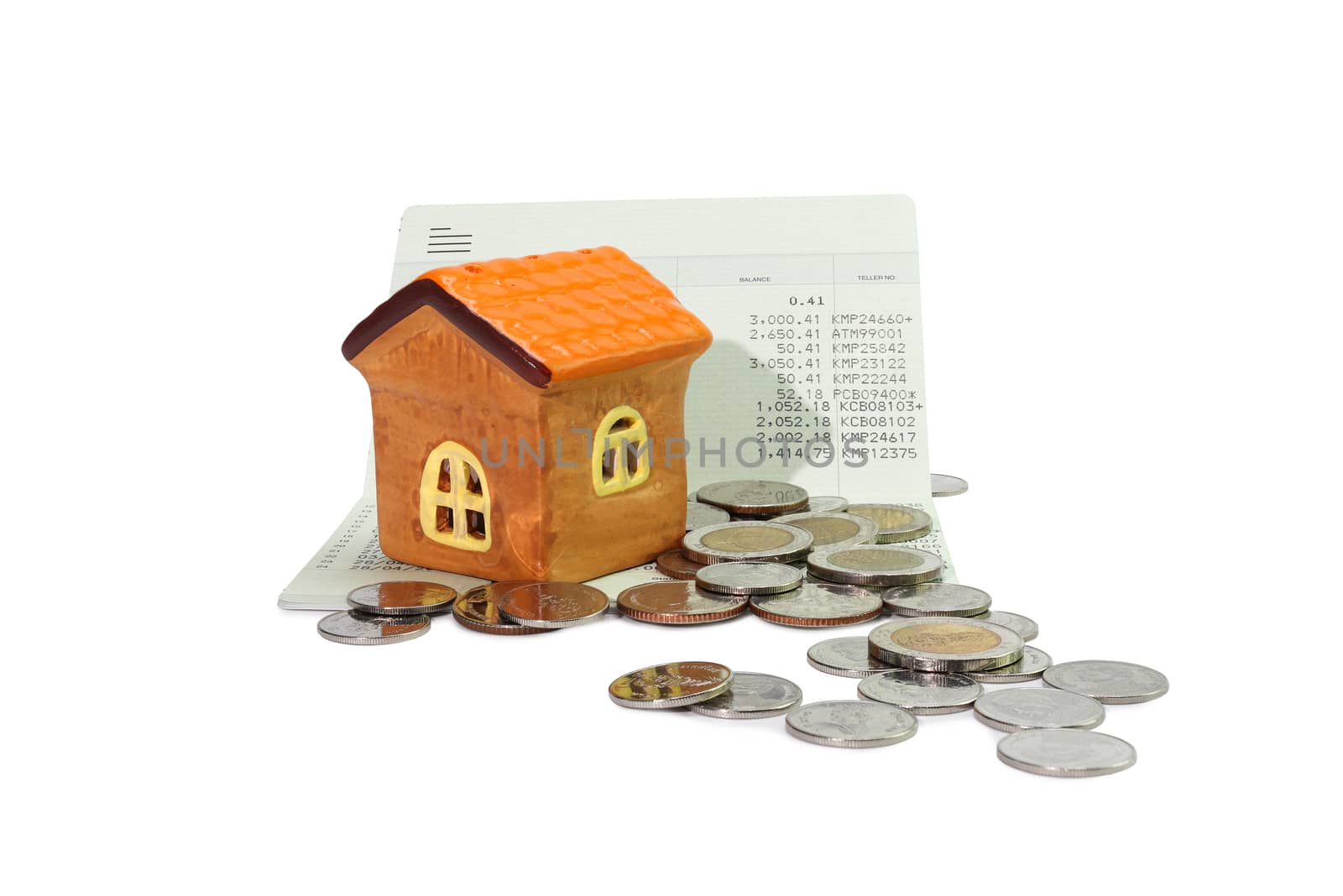 Model house with coin, calculator, book bank, concept Collecting money Buying a house, residence, business, finance