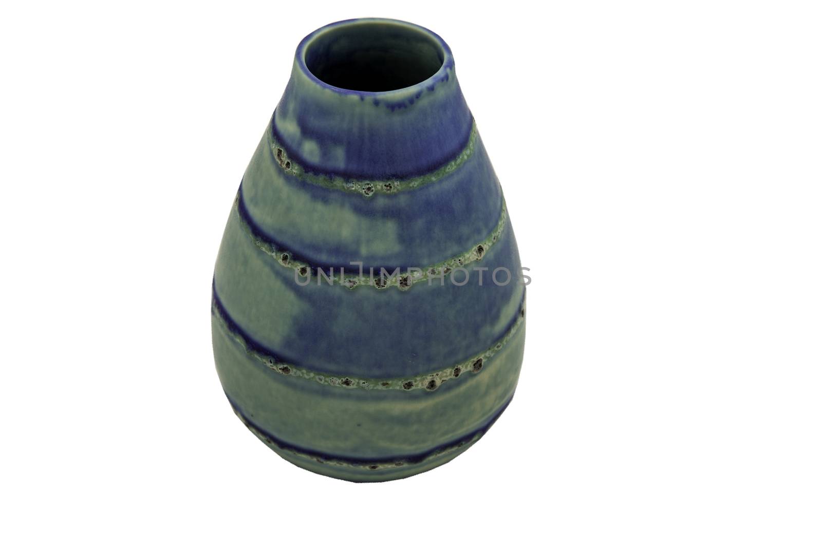 Beautiful blue ceramic vase handmade isolated on white background with clipping path.