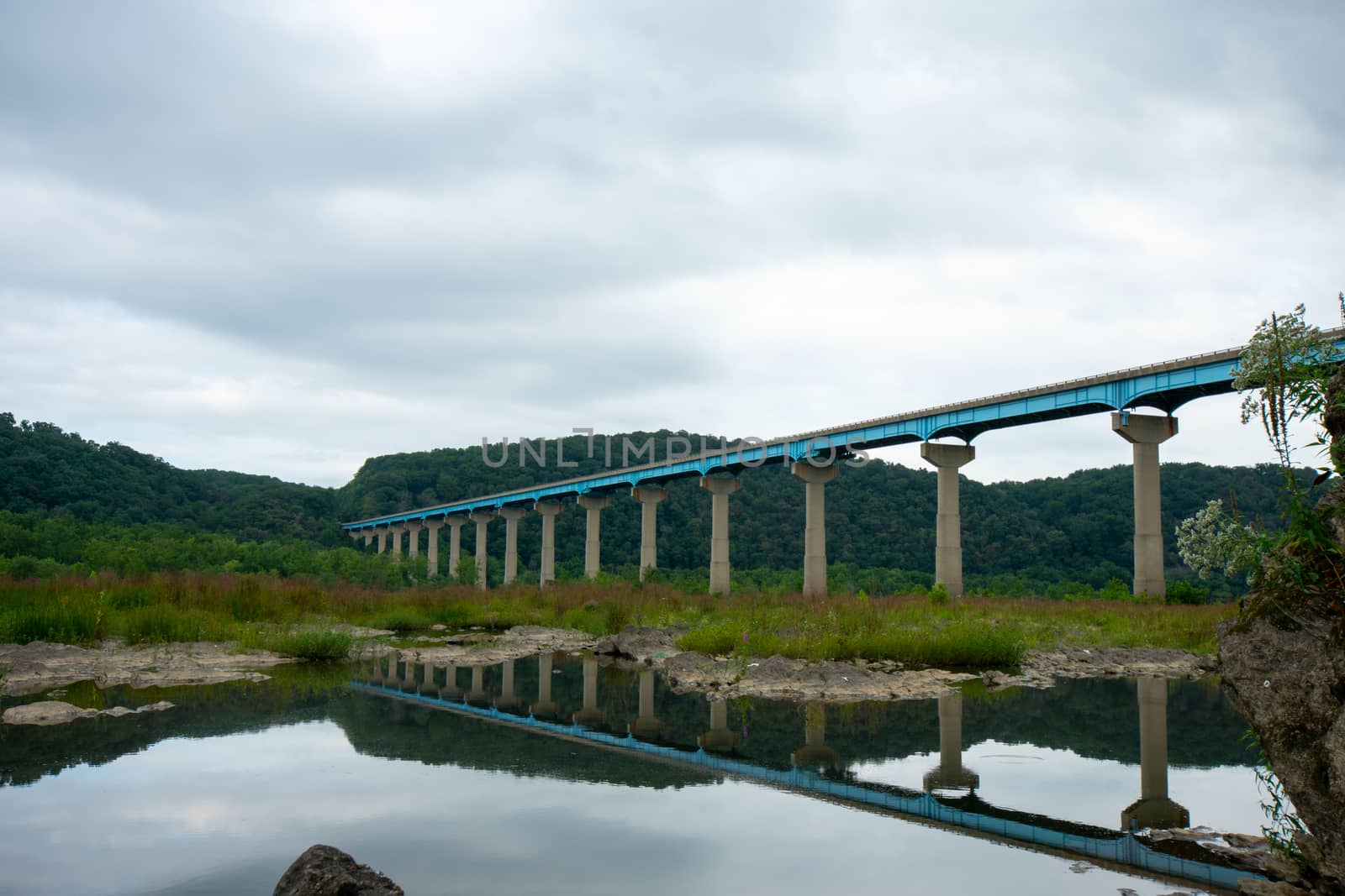 The Norman Wood Bridge Over the Susquehanna River Reflecting In  by bju12290