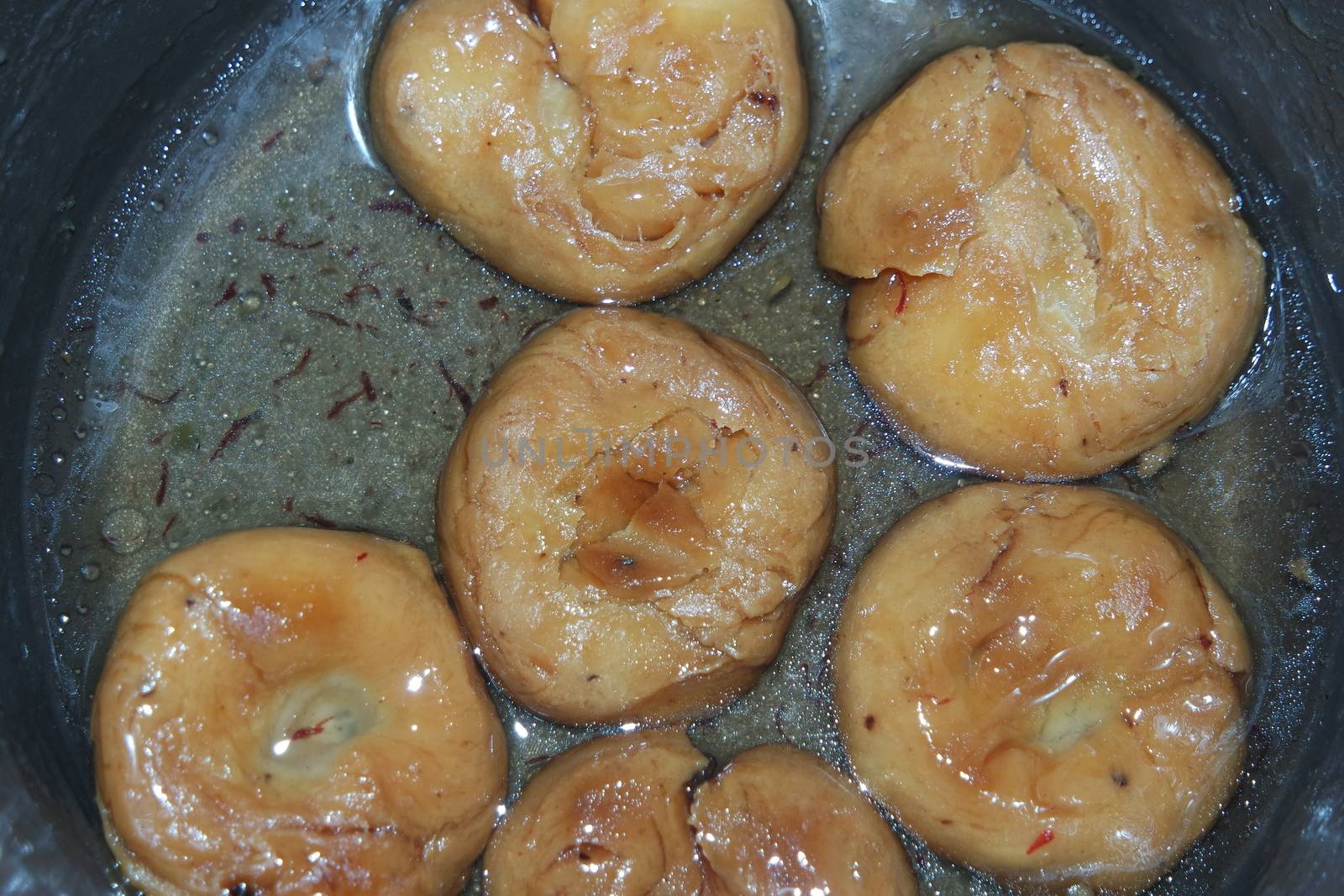 Closeup of delicious and tasty Asian sweet dish called balu shahi or baloshahi. by Photochowk