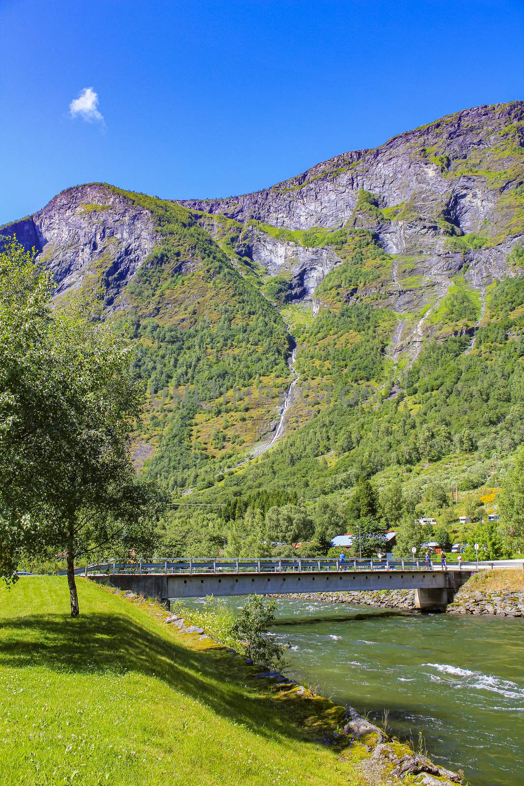 Bridge and fjord in beautiful Flåm in Aurlandsfjord Sognefjord Norway. by Arkadij