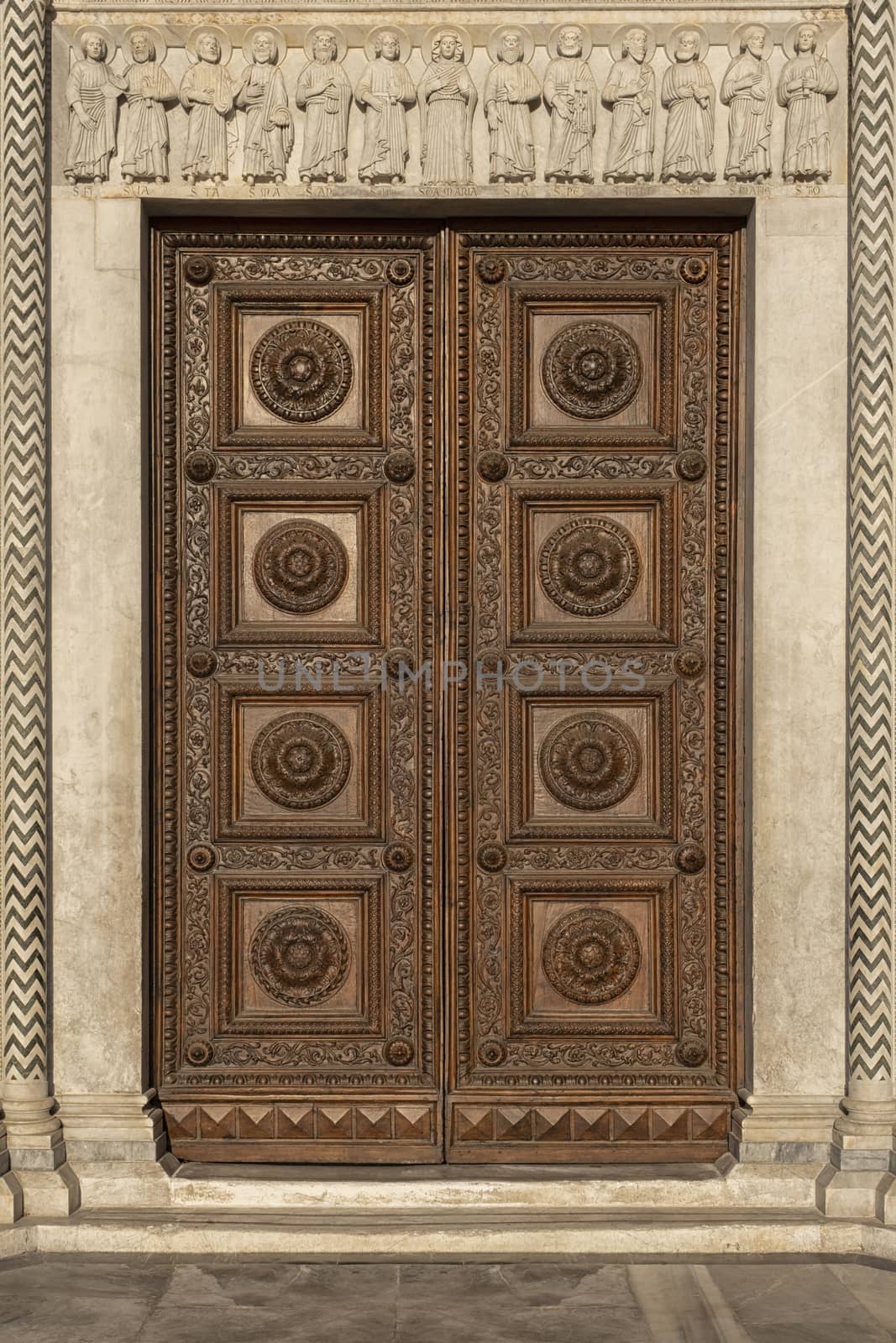 old ornate wooden door with beautiful carvings by Tjeerdkruse