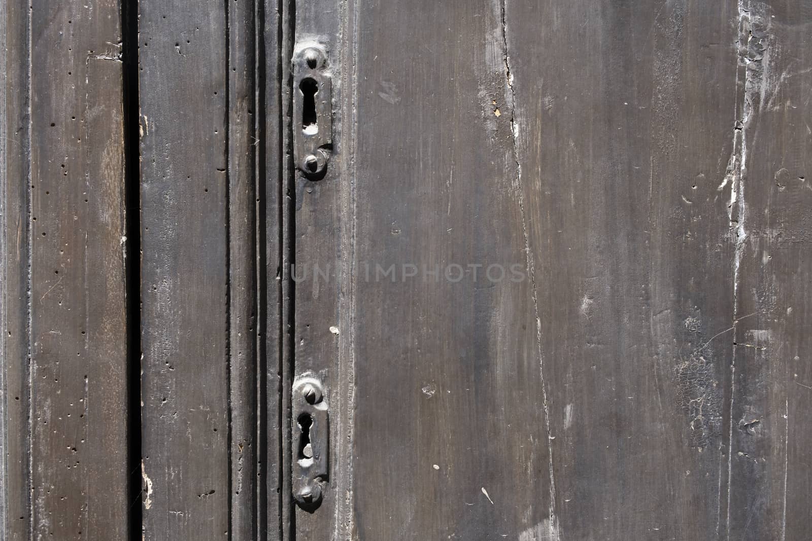 old ornate wooden door with beautiful carvings in italy