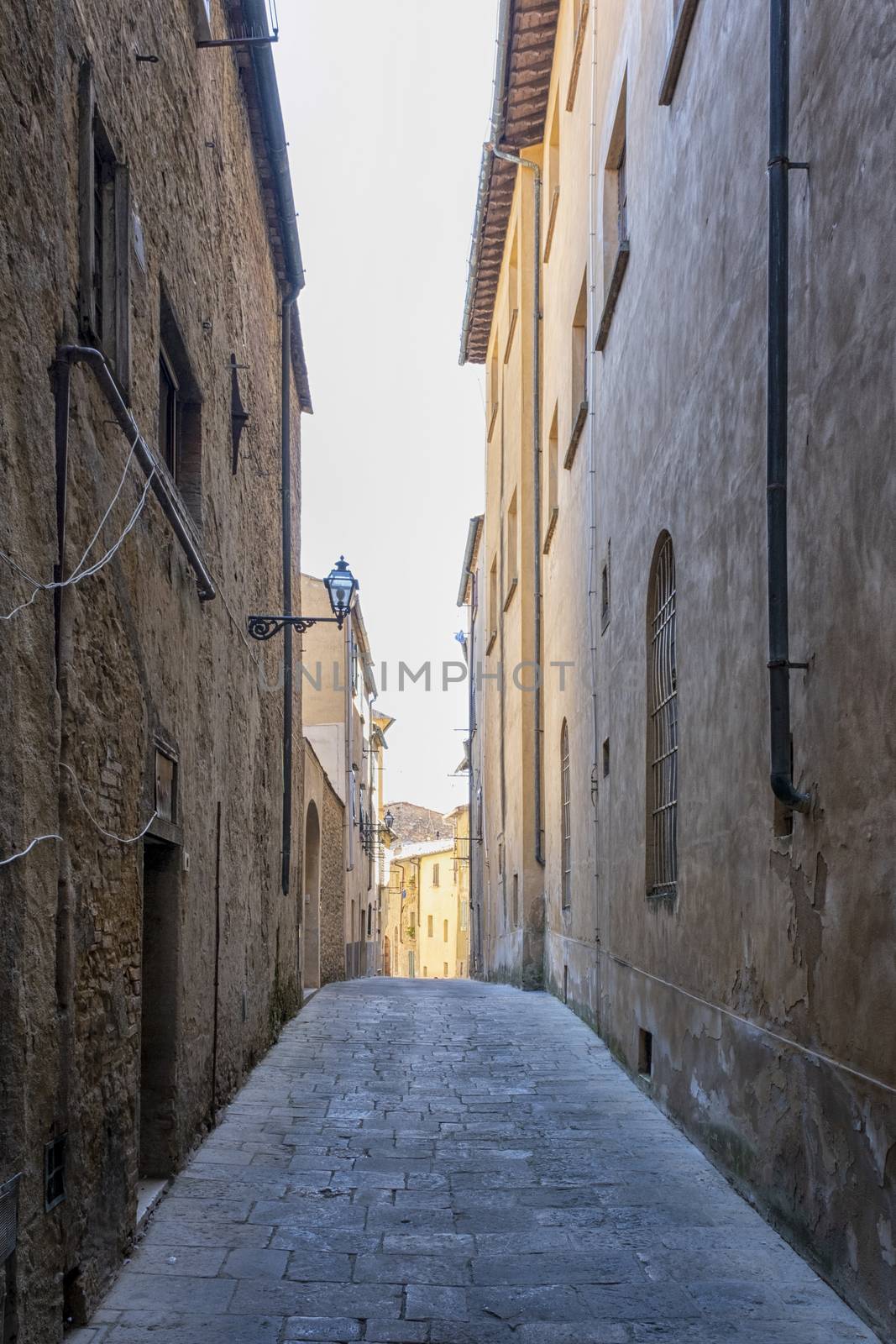 old narrow alley in tuscan village. antique italian lane, Tuscany, Italy