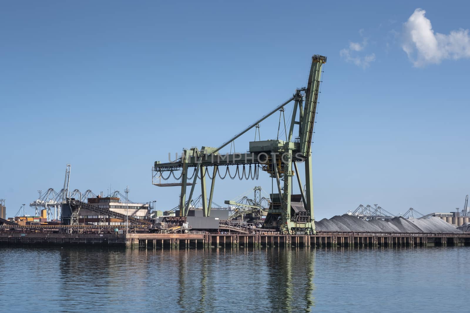 Type of cargo terminal and cranes, berths for transshipment of bulk cargo, iron ore and coal.