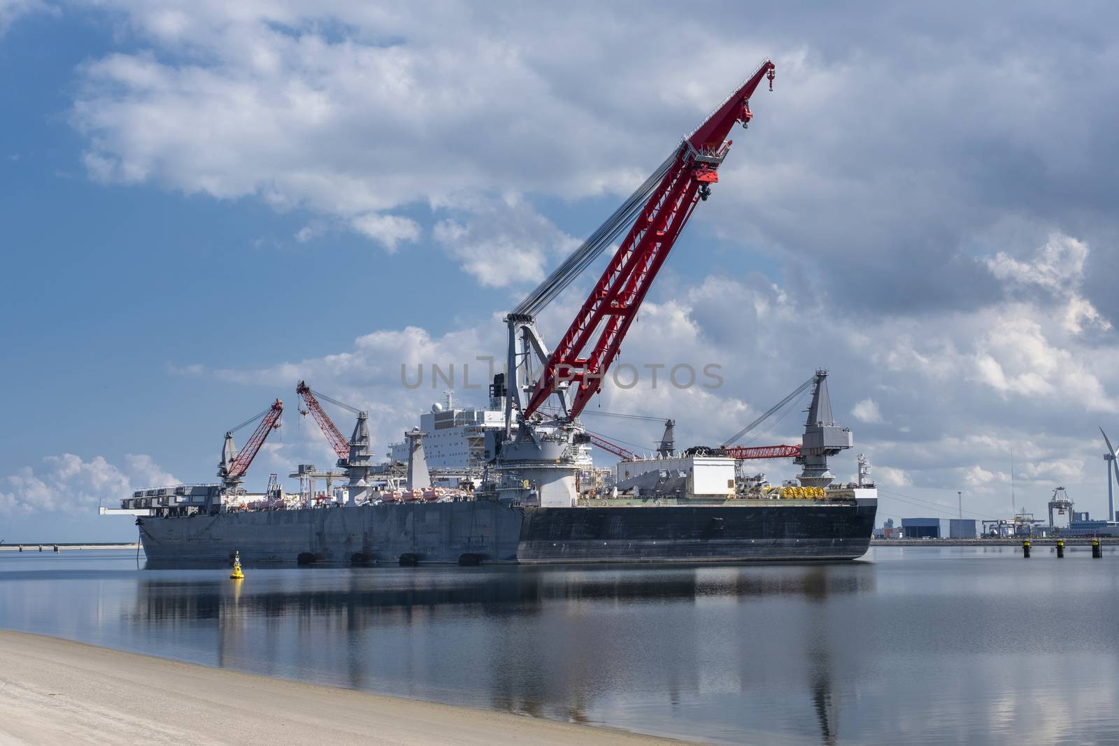 The crane and construction vessel in the harbor of Rotterdam. 2e maasvlakte