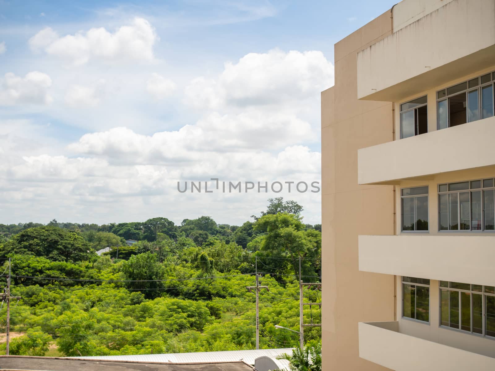 Corner of a building and sky and clouds.  Concept of architectur by Unimages2527