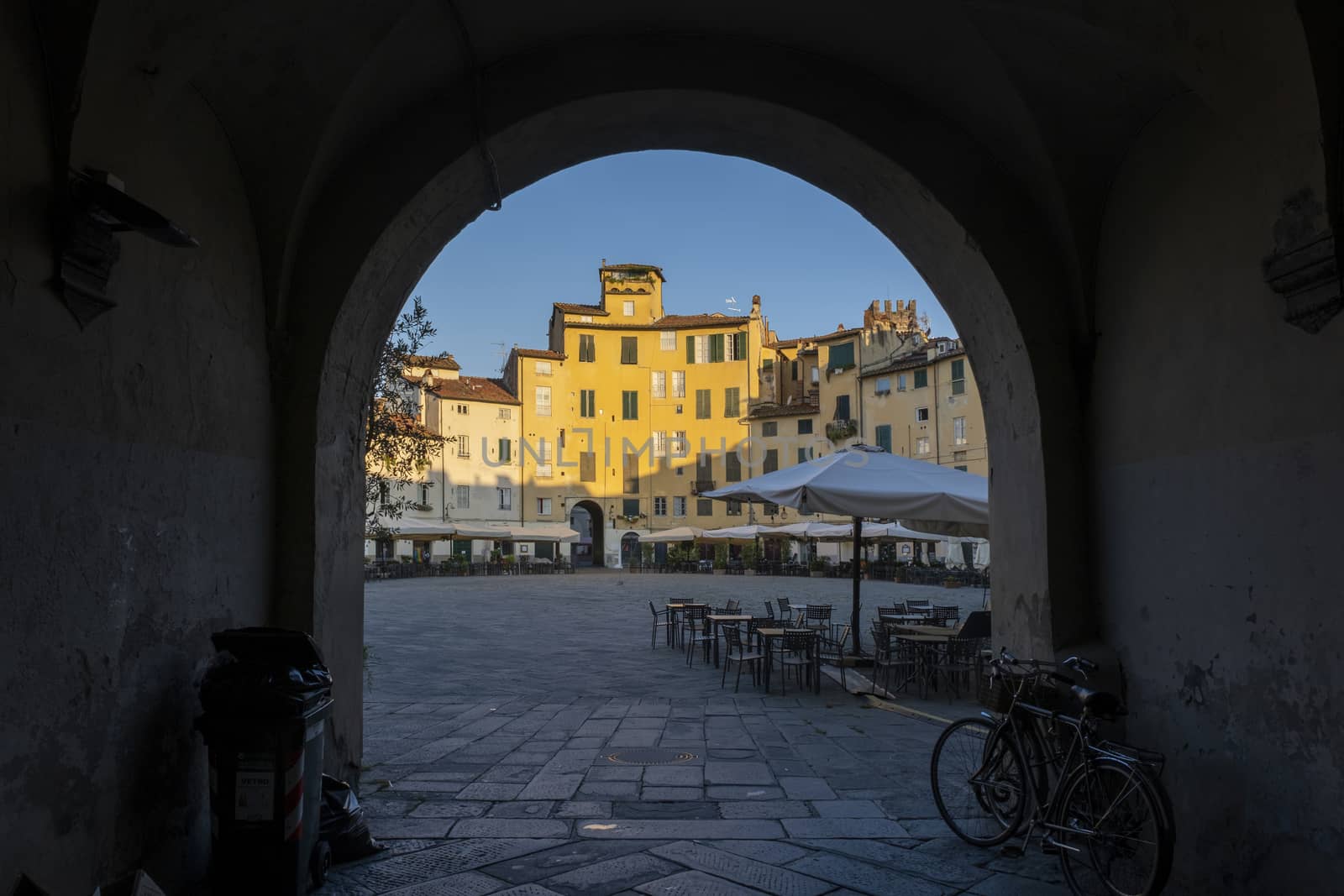 Anfiteatro square in Lucca. Lucca is a thriving and cosmopolitan city, with a rich history and culture, and many museums and churches.effect vintage