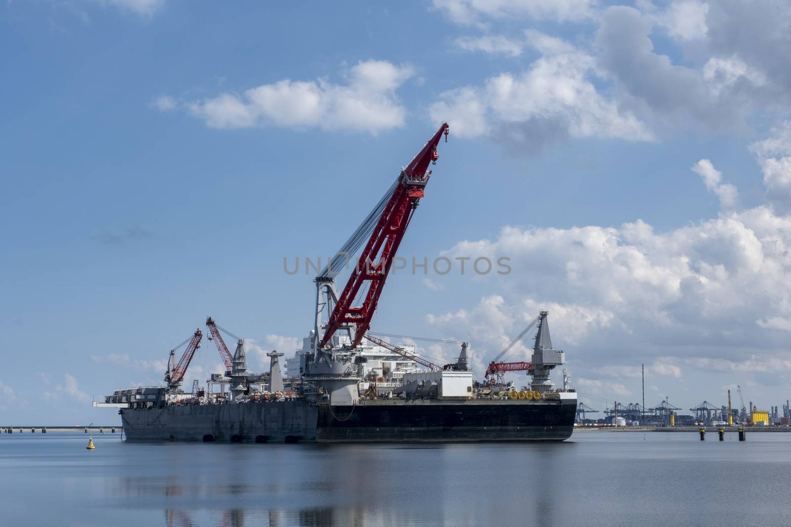 ROTTERDAM, MAASVLAKTE, THE NETHERLANDS Construction vessel moored at the Maasvlakte, Rotterdam in The Netherlands with the new 5000 tonne crane. by Tjeerdkruse