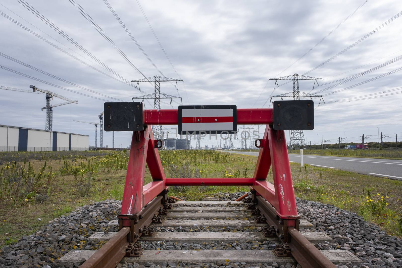 red railroad buffer end to destination in the europoort holland near rotterdam by Tjeerdkruse