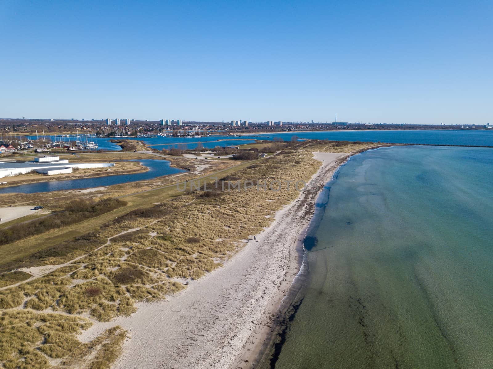Ishoj, Denmark - March 21, 2020: Aerial drone view of the sand beach in Ishoj south of Copenhagen