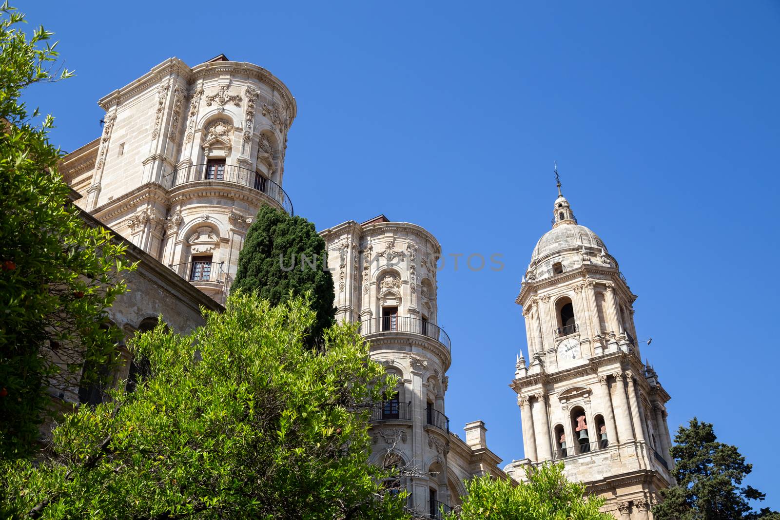 Malaga, Spain - May 25, 2019:  Exterior view of the cathedral in the historic city centre.