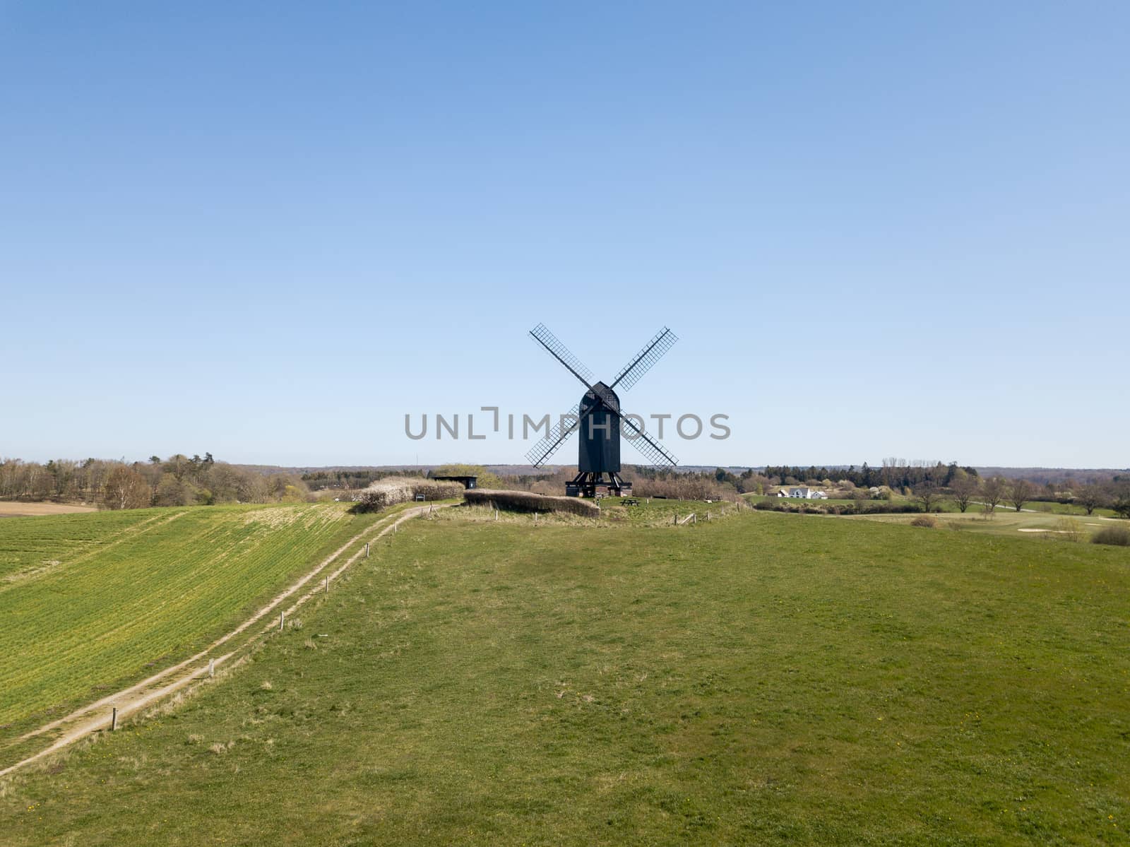 Aerial View of Historic Danish Windmill by oliverfoerstner