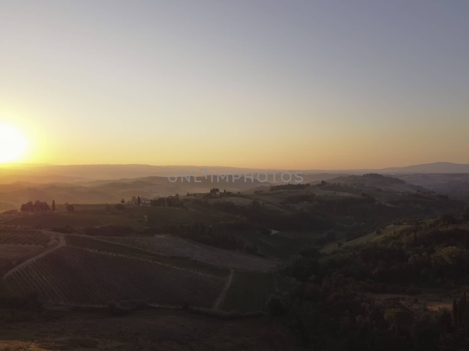 Amazing sunset panoramic view of towers of old town San Giminiano, Tuscany, Italy by Tjeerdkruse