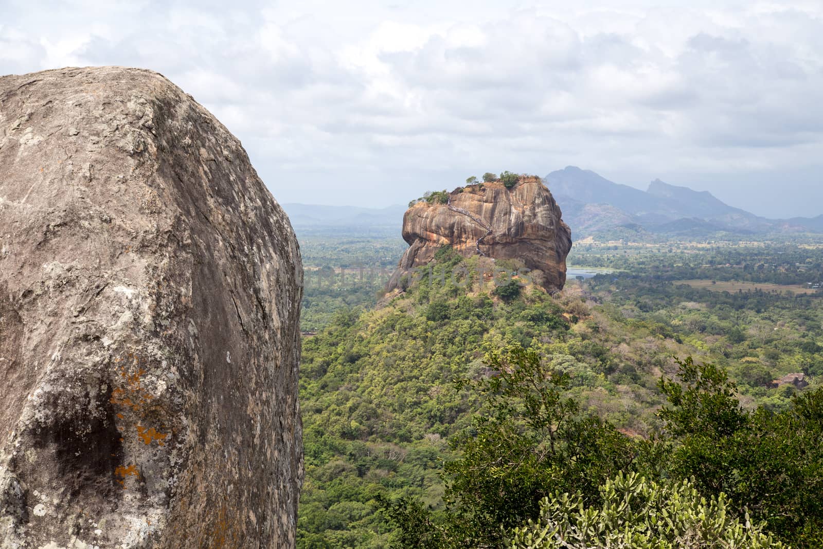 Sigiriya, Sri Lanka - August 17, 2018: The ancient Lion Rock as seen from Pidurangala Rock