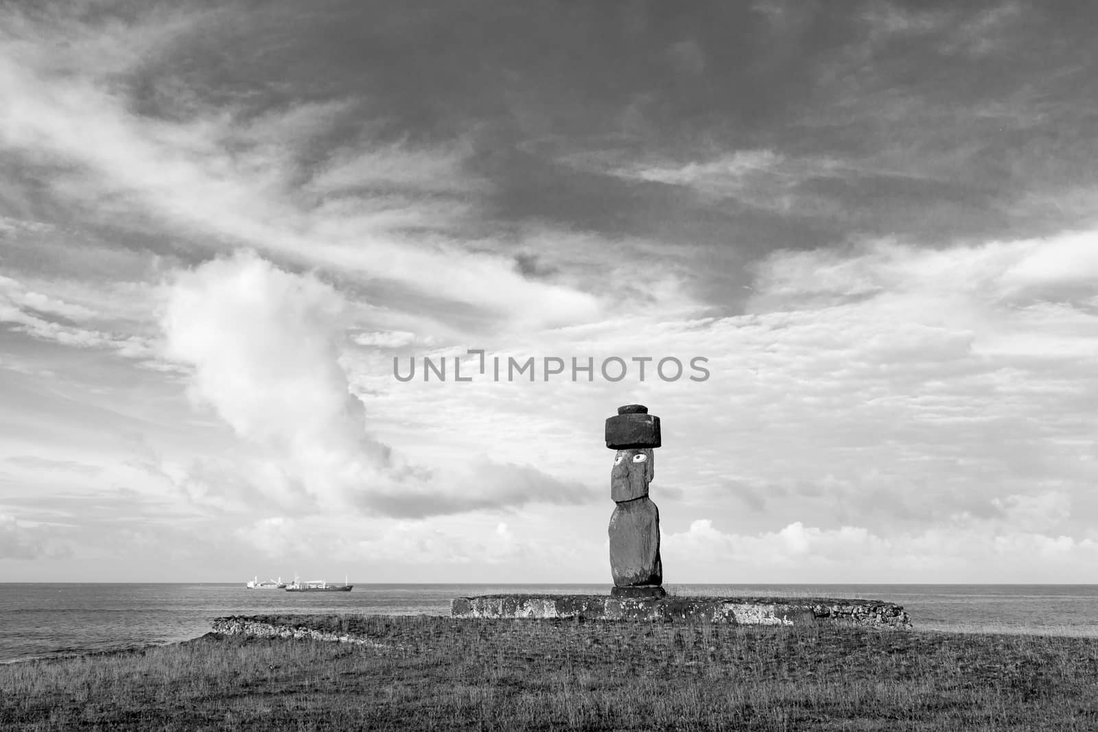 Black and white photo of a moai statue at Ahu Tahai on Easter Island in Chile