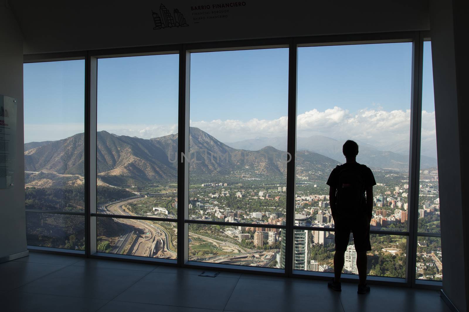 Silhouette of man enjoying view from Gran Torre Santiago in Santiago de Chile.