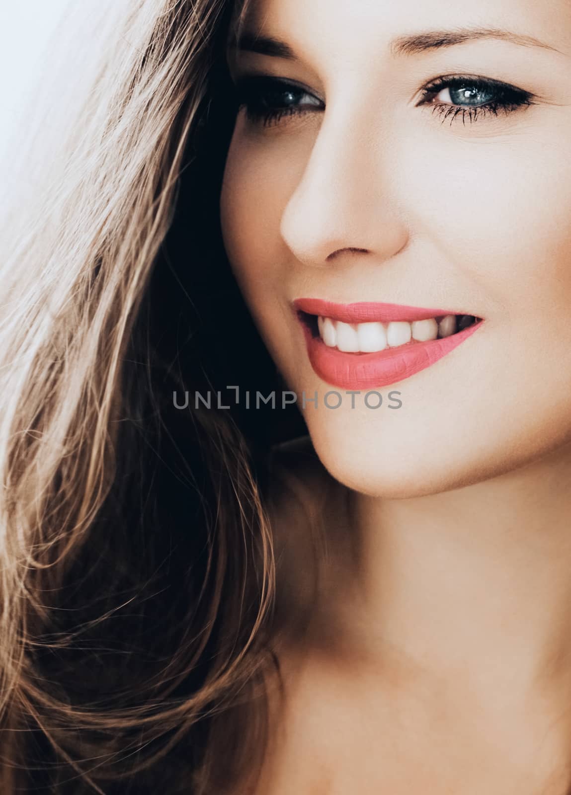 Elegant woman smiling, brunette with long light brown hair, model wearing natural makeup look, female showing healthy white teeth, beauty portrait for cosmetic or lifestyle brand by Anneleven