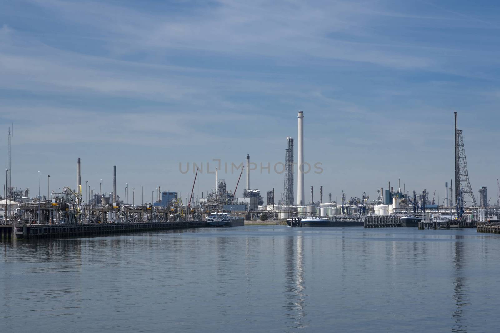 Industrial area in the Port of Rotterdam in The Netherlands by Tjeerdkruse